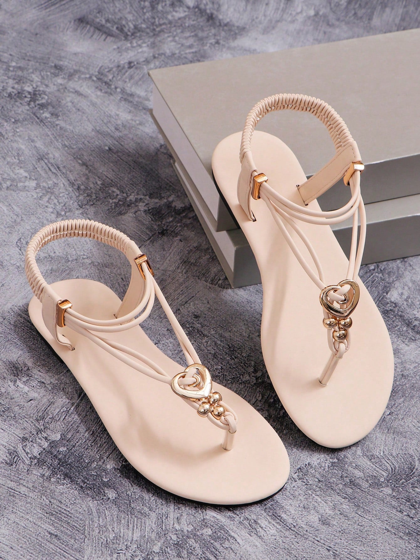 Women's slip-on flat gladiator sandals with beaded detail and toe post design