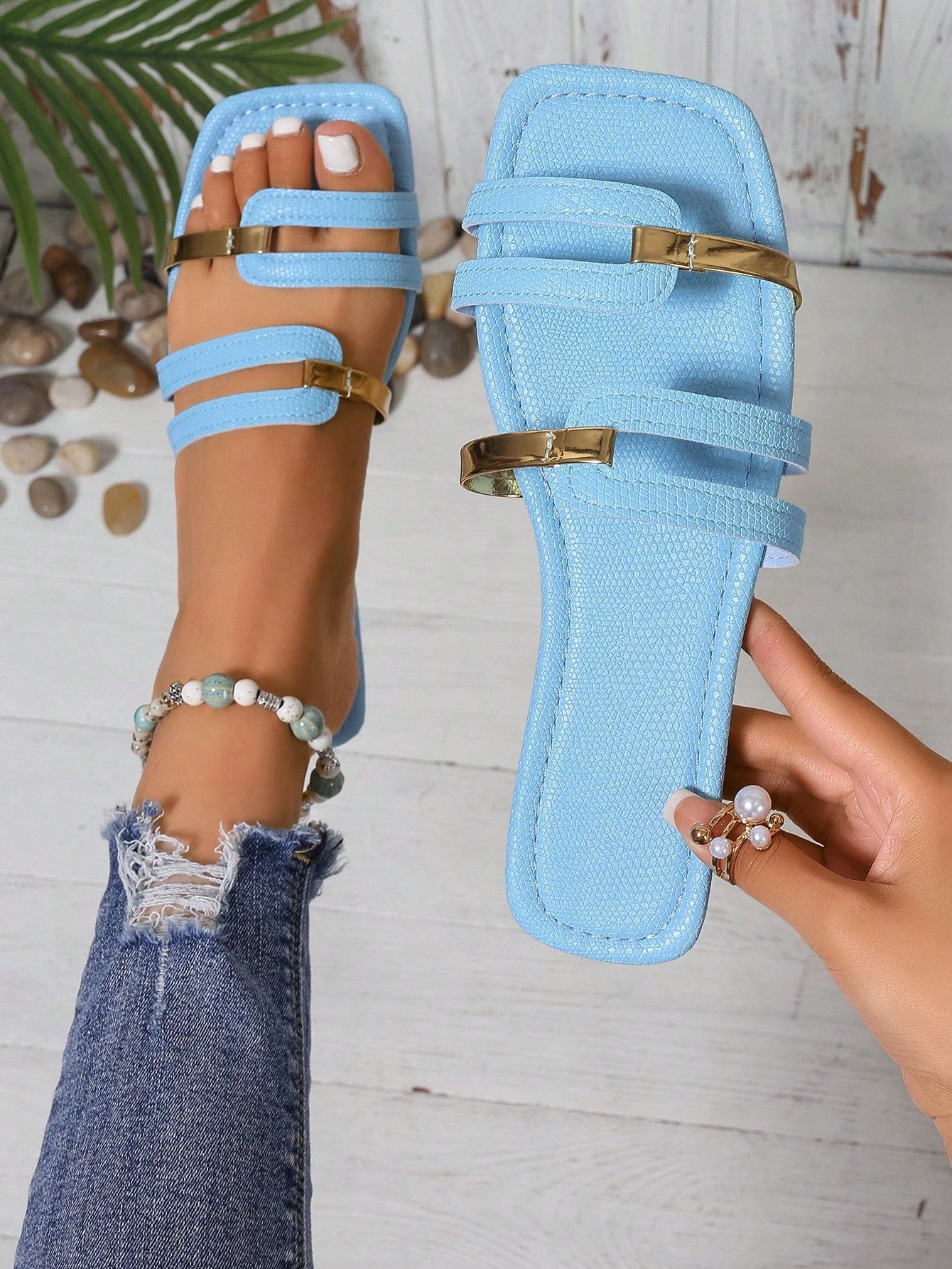 Women's yellow open-toe flat slide sandals featuring a cut-out design and textured plain pattern for casual beach and daily wear.