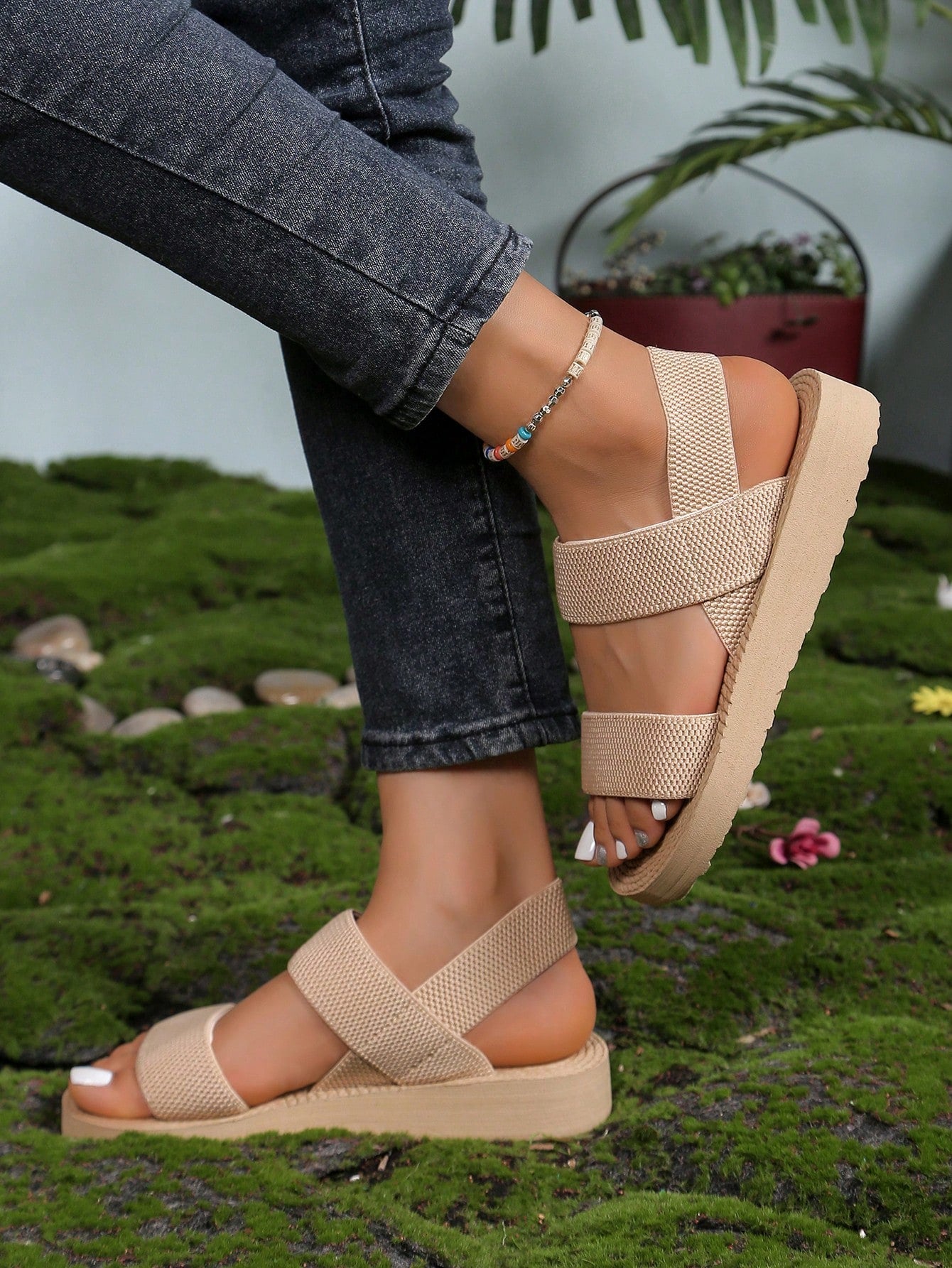 Women's khaki flat gladiator sandals with open toe and woven jute-texture styling, lightweight design for outdoor beach comfort and spring summer outfits.