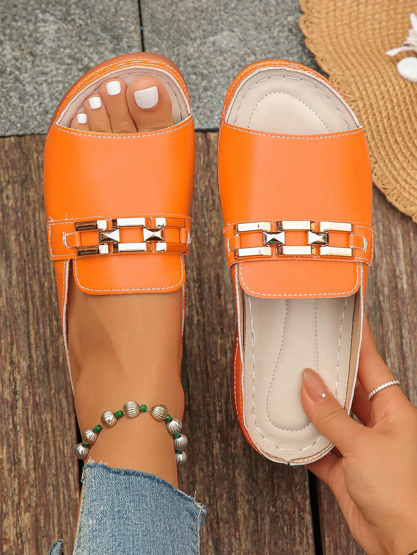 Women's bohemian wedge slide sandals with open toe, low wedge heel, slip-on design, and metal detail, available in plus sizes 36-43.