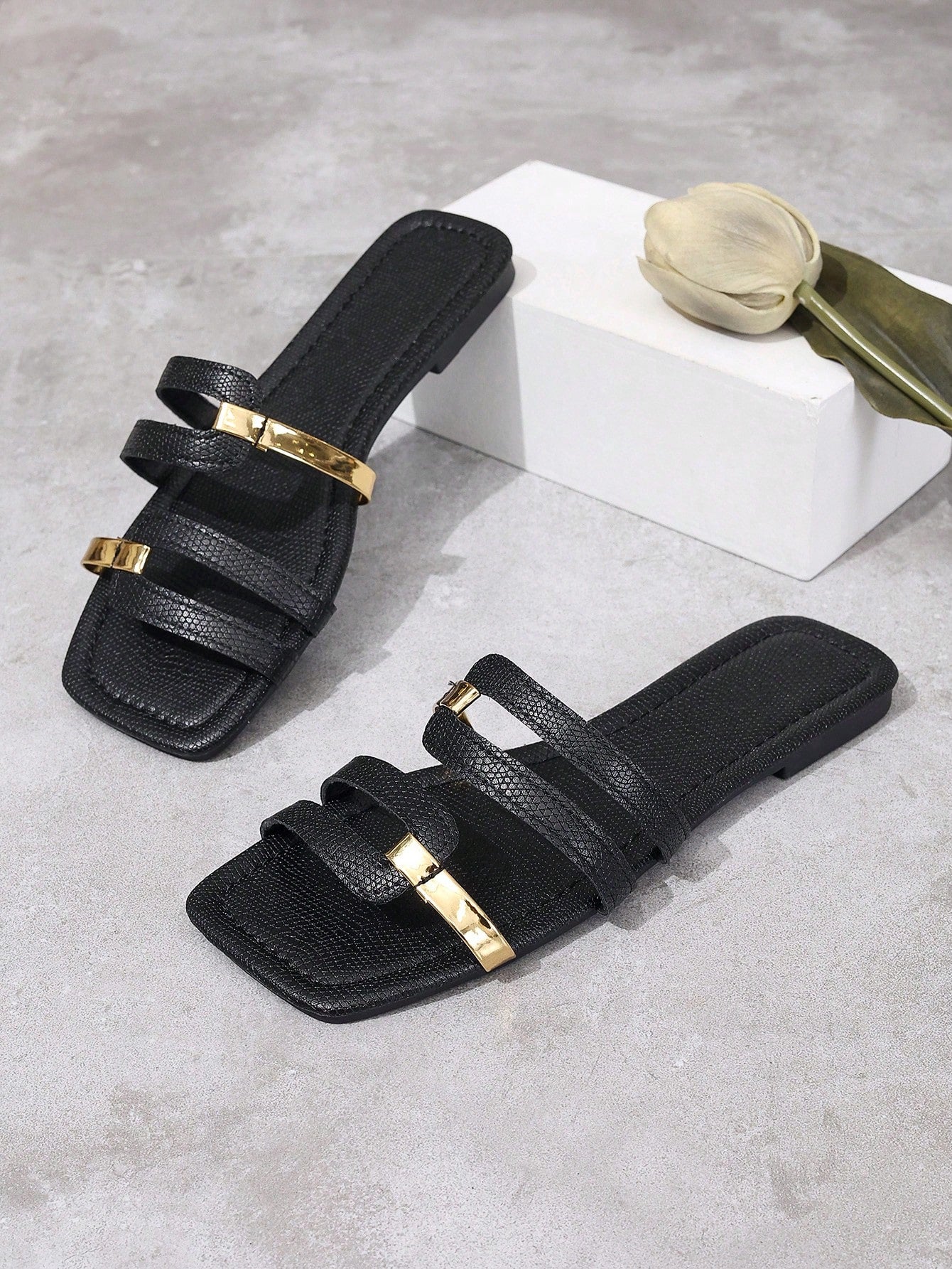 Women's yellow open-toe flat slide sandals featuring a cut-out design and textured plain pattern for casual beach and daily wear.