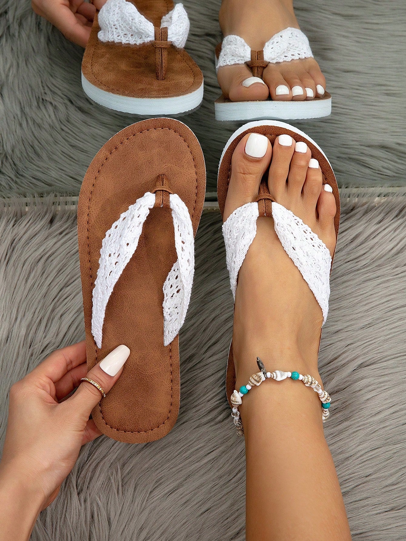 Women's flat lace slide sandals with an open-toe, hollow breathable upper and lightweight beach slipper design.