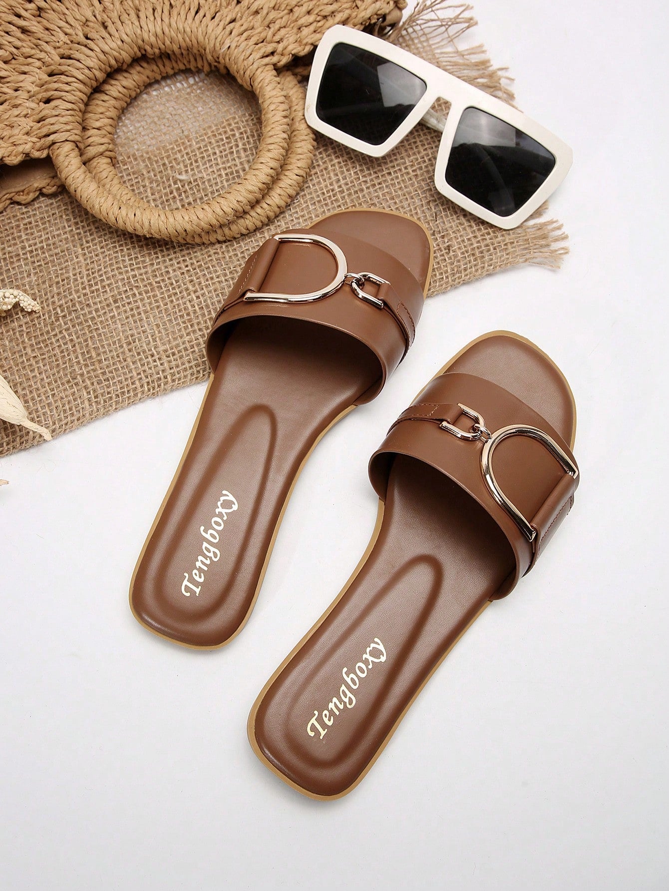 Women's chic flat sandals with ankle strap, cut-out design, colorblock pattern, and open toe, suitable for casual streetwear and beach wear.