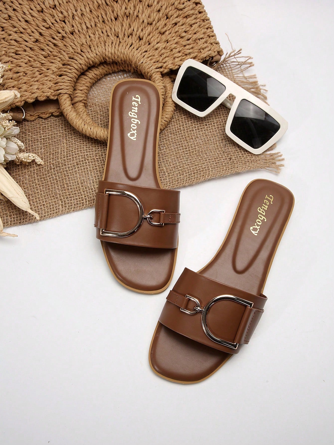 Women's chic flat sandals with ankle strap, cut-out design, colorblock pattern, and open toe, suitable for casual streetwear and beach wear.