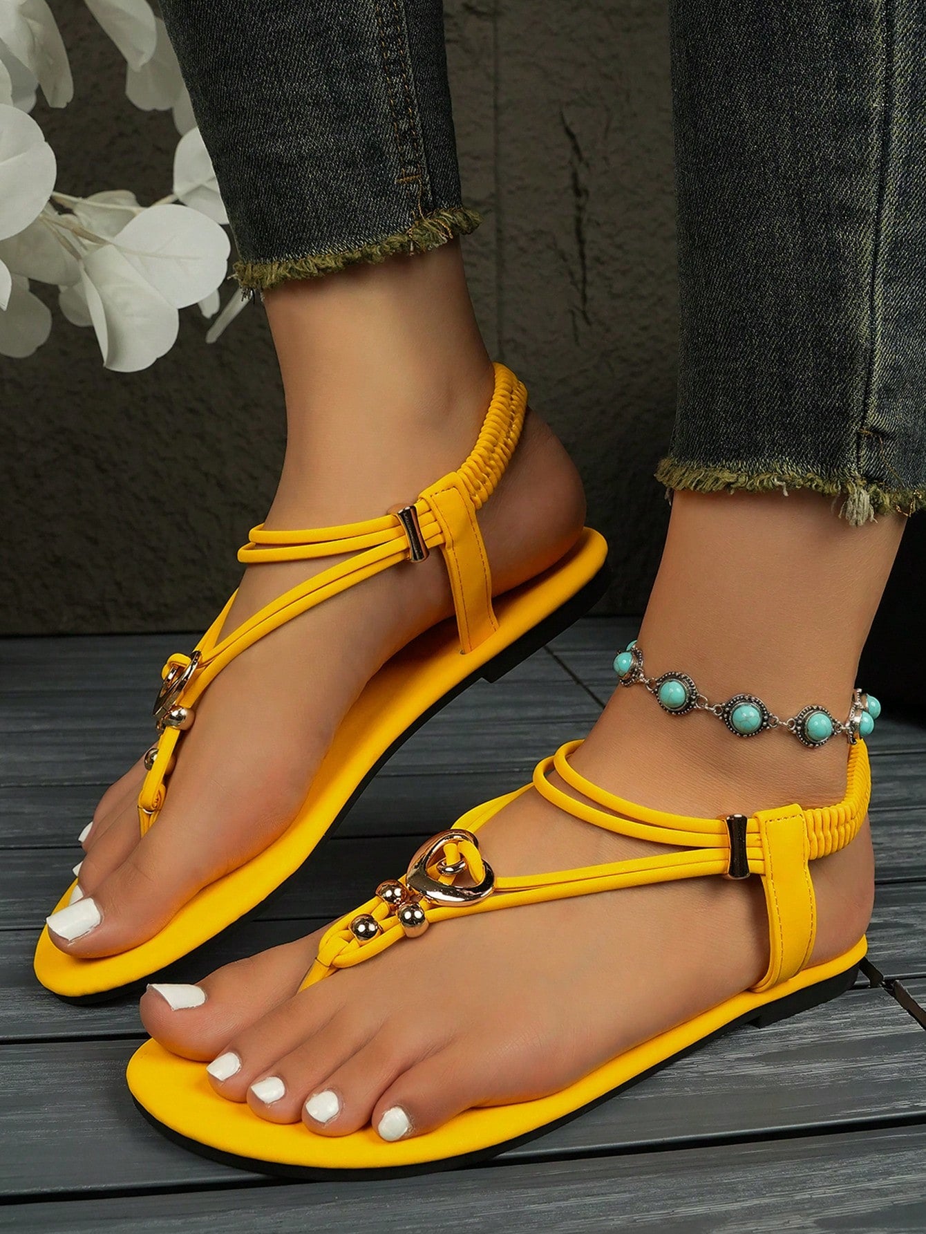 Women's slip-on flat gladiator sandals with beaded detail and toe post design
