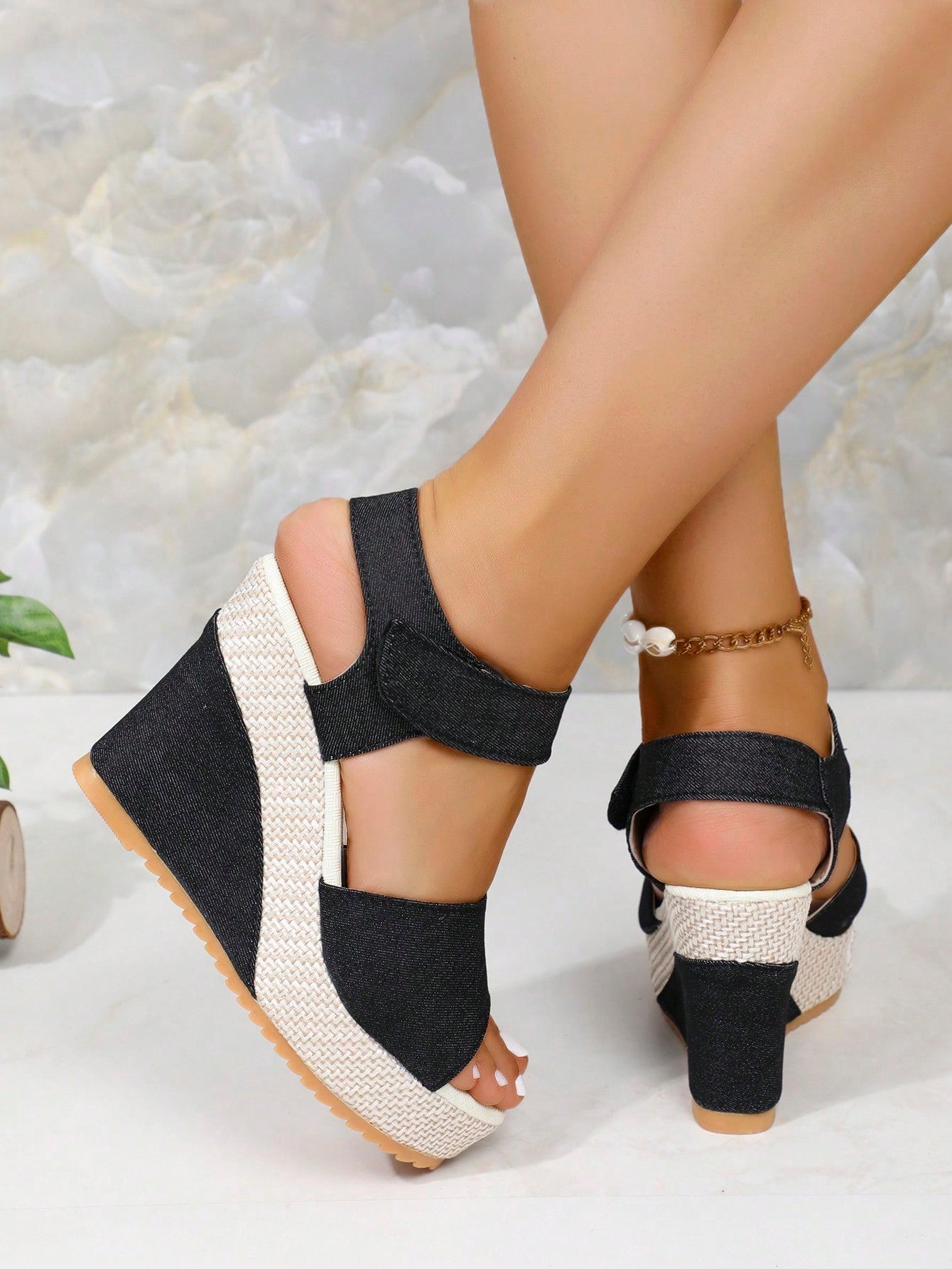 Women’s platform slide wedge sandals with open toe, thick sole, high wedge heel, and hook-and-loop ankle strap.