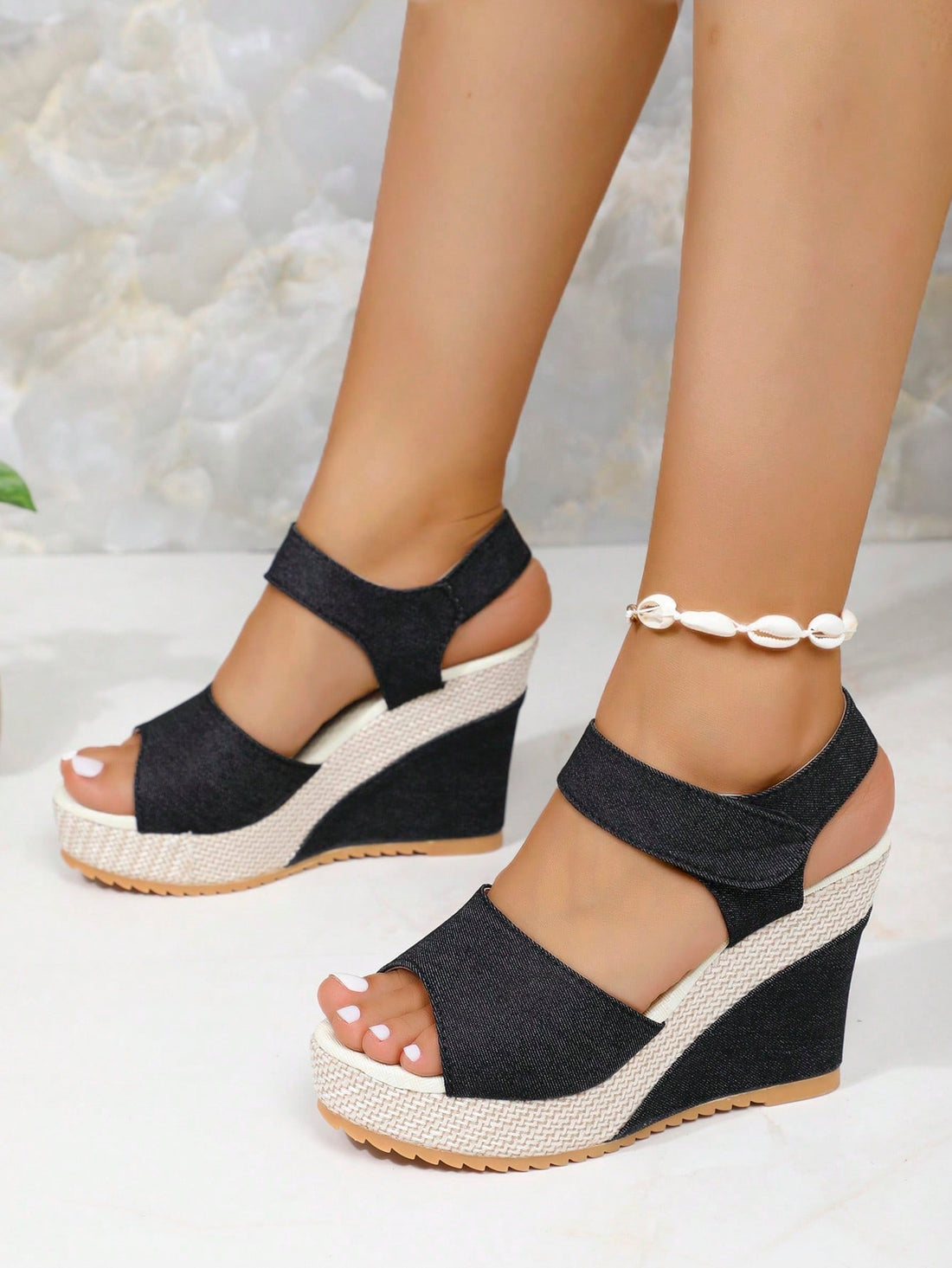 Women’s platform slide wedge sandals with open toe, thick sole, high wedge heel, and hook-and-loop ankle strap.