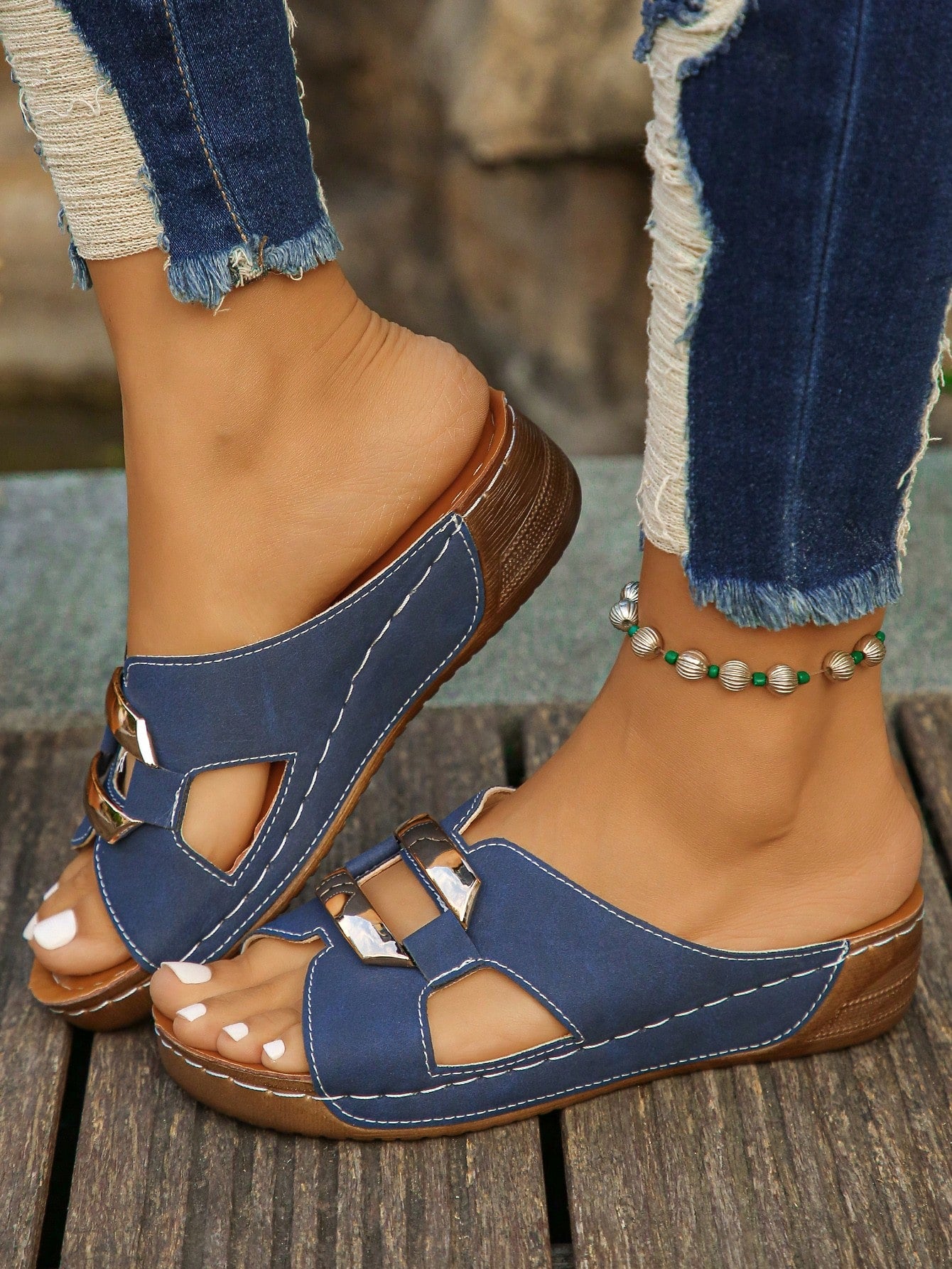 Women’s open toe wedge slide sandals with metal buckle detail and thick low wedge sole, lightweight slip-on style for daily wear, beach, and holiday use.