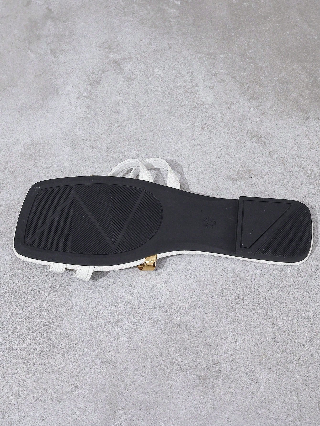 Women's yellow open-toe flat slide sandals featuring a cut-out design and textured plain pattern for casual beach and daily wear.
