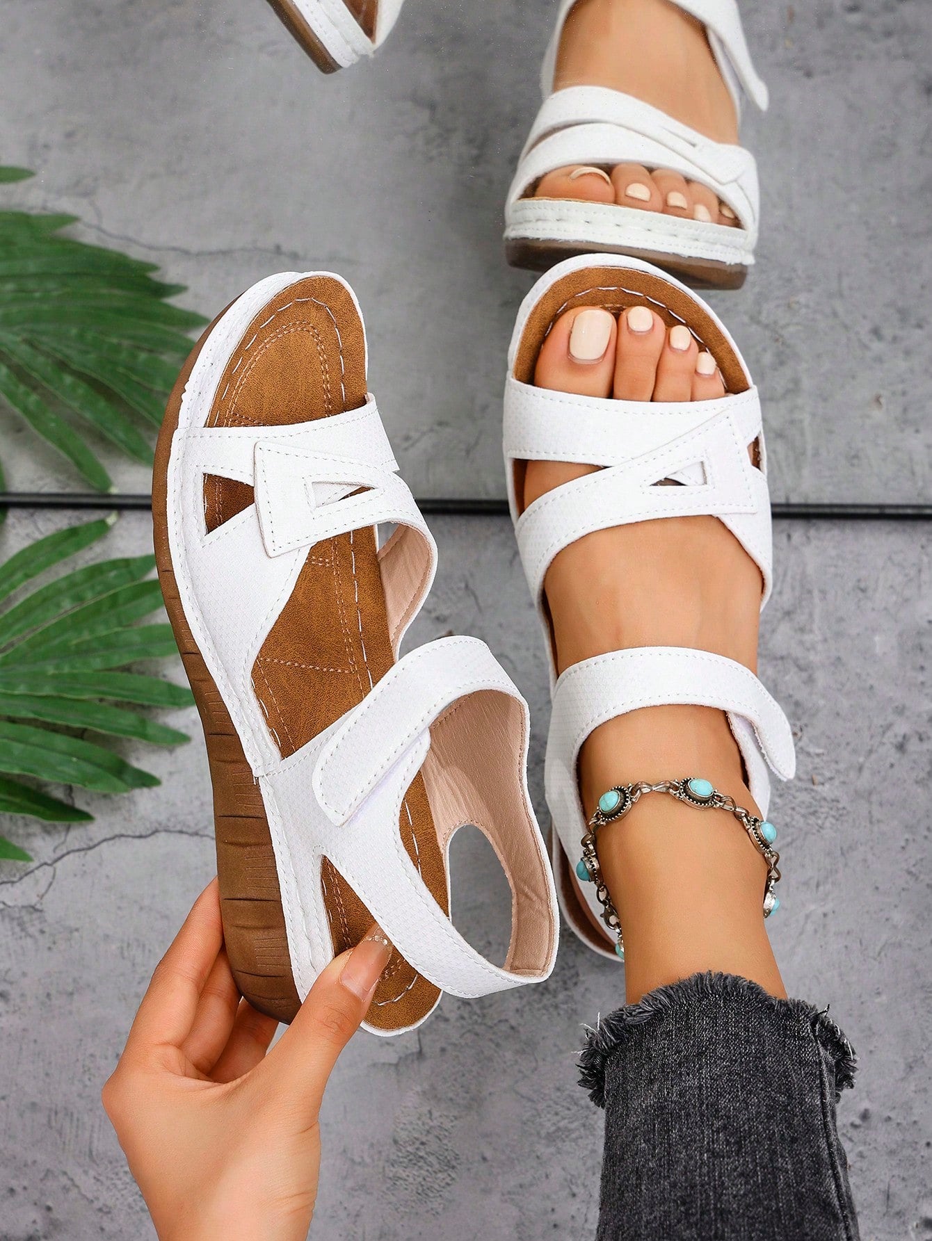 Women's open-toe wedge slide sandals with studded hollow-out upper, cross-over straps, buckle closure, and thick soft sole