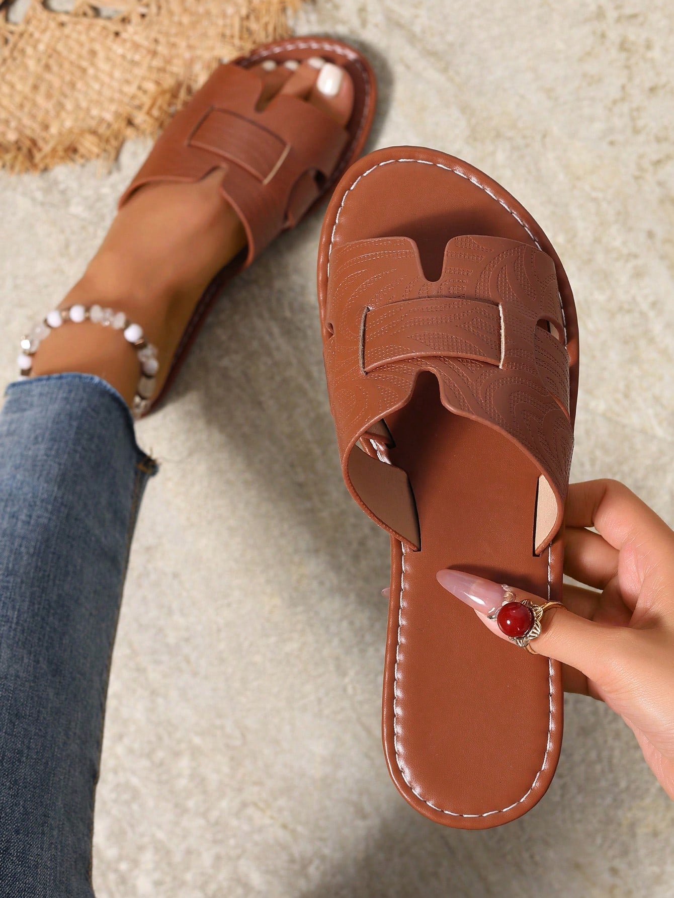 Women's open-toe flat slide sandals with slip-on design and metal decoration, suitable for outdoor casual summer wear.