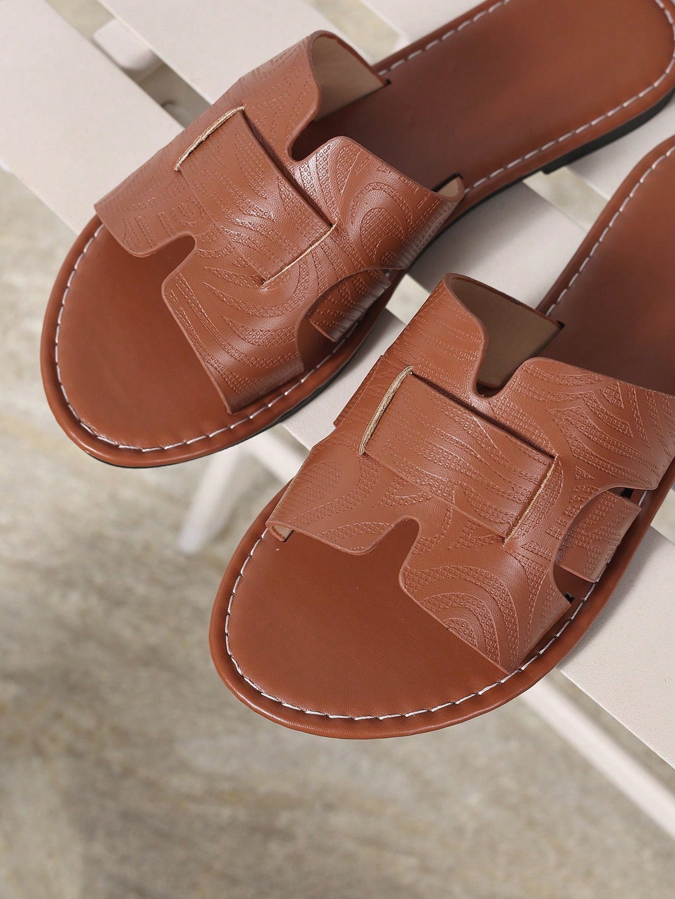 Women's open-toe flat slide sandals with slip-on design and metal decoration, suitable for outdoor casual summer wear.