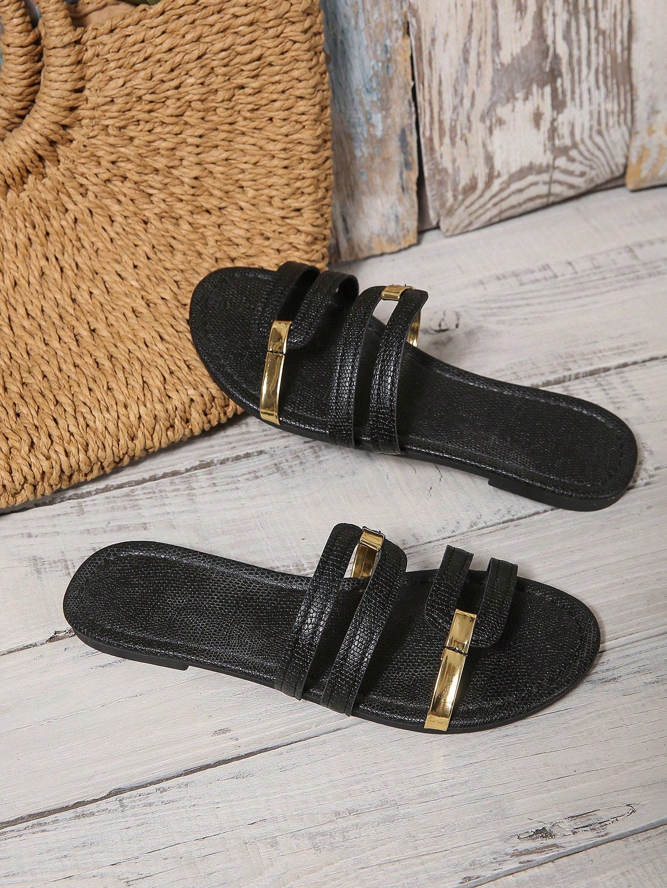 Women's yellow open-toe flat slide sandals featuring a cut-out design and textured plain pattern for casual beach and daily wear.
