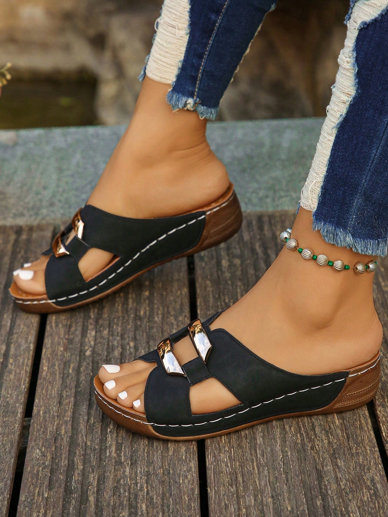 Women’s open toe wedge slide sandals with metal buckle detail and thick low wedge sole, lightweight slip-on style for daily wear, beach, and holiday use.