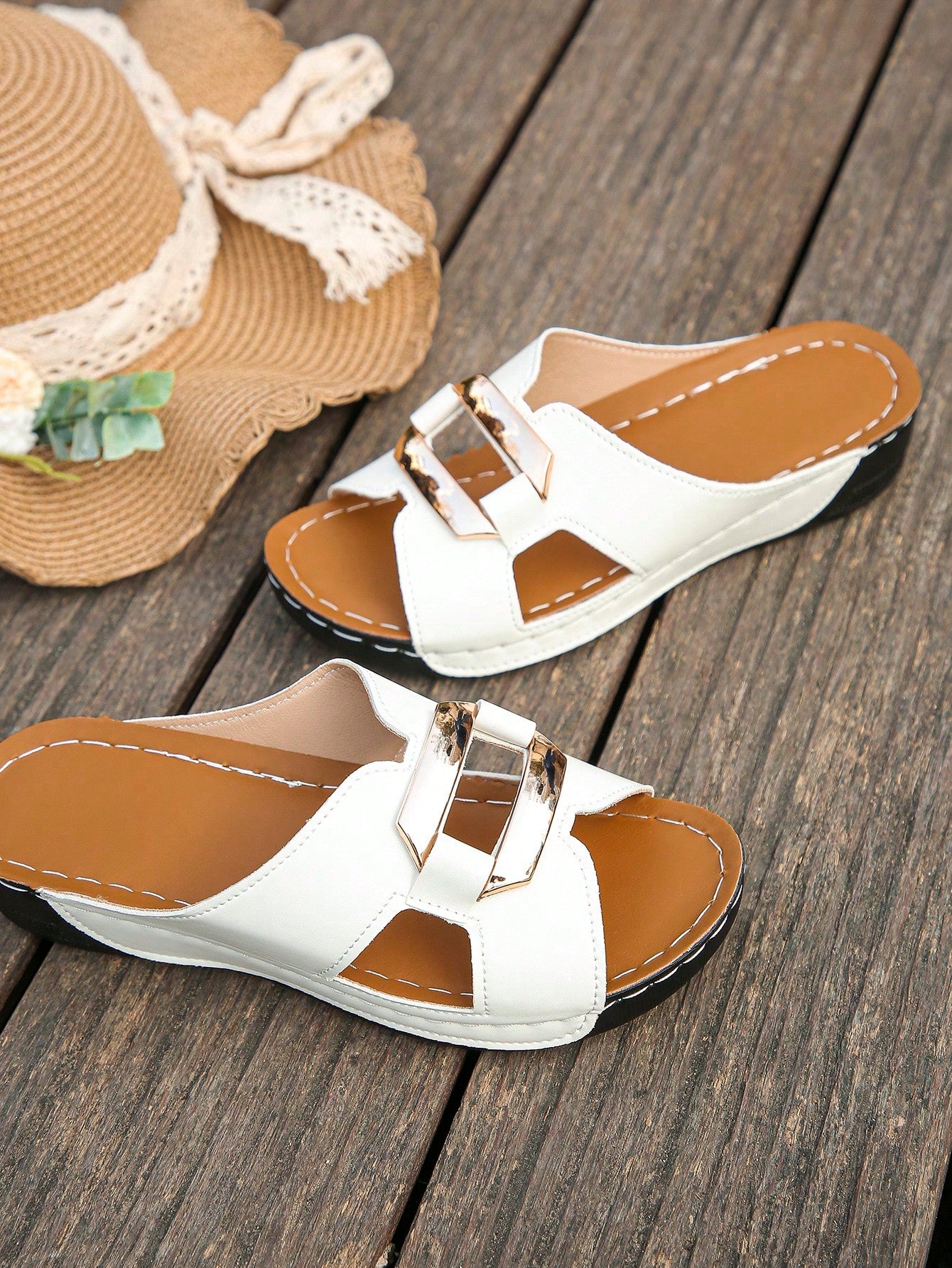 Women’s open toe wedge slide sandals with metal buckle detail and thick low wedge sole, lightweight slip-on style for daily wear, beach, and holiday use.