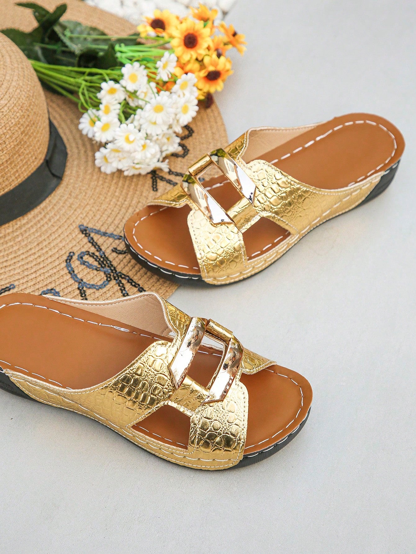 Women’s open toe wedge slide sandals with metal buckle detail and thick low wedge sole, lightweight slip-on style for daily wear, beach, and holiday use.