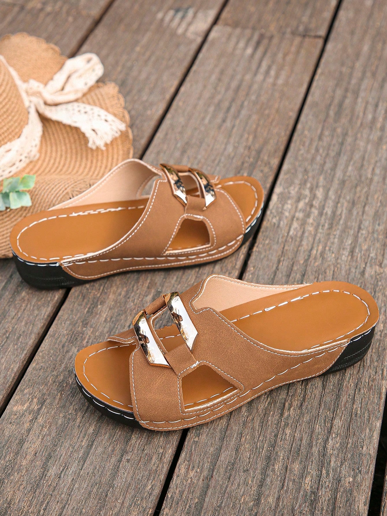 Women’s open toe wedge slide sandals with metal buckle detail and thick low wedge sole, lightweight slip-on style for daily wear, beach, and holiday use.