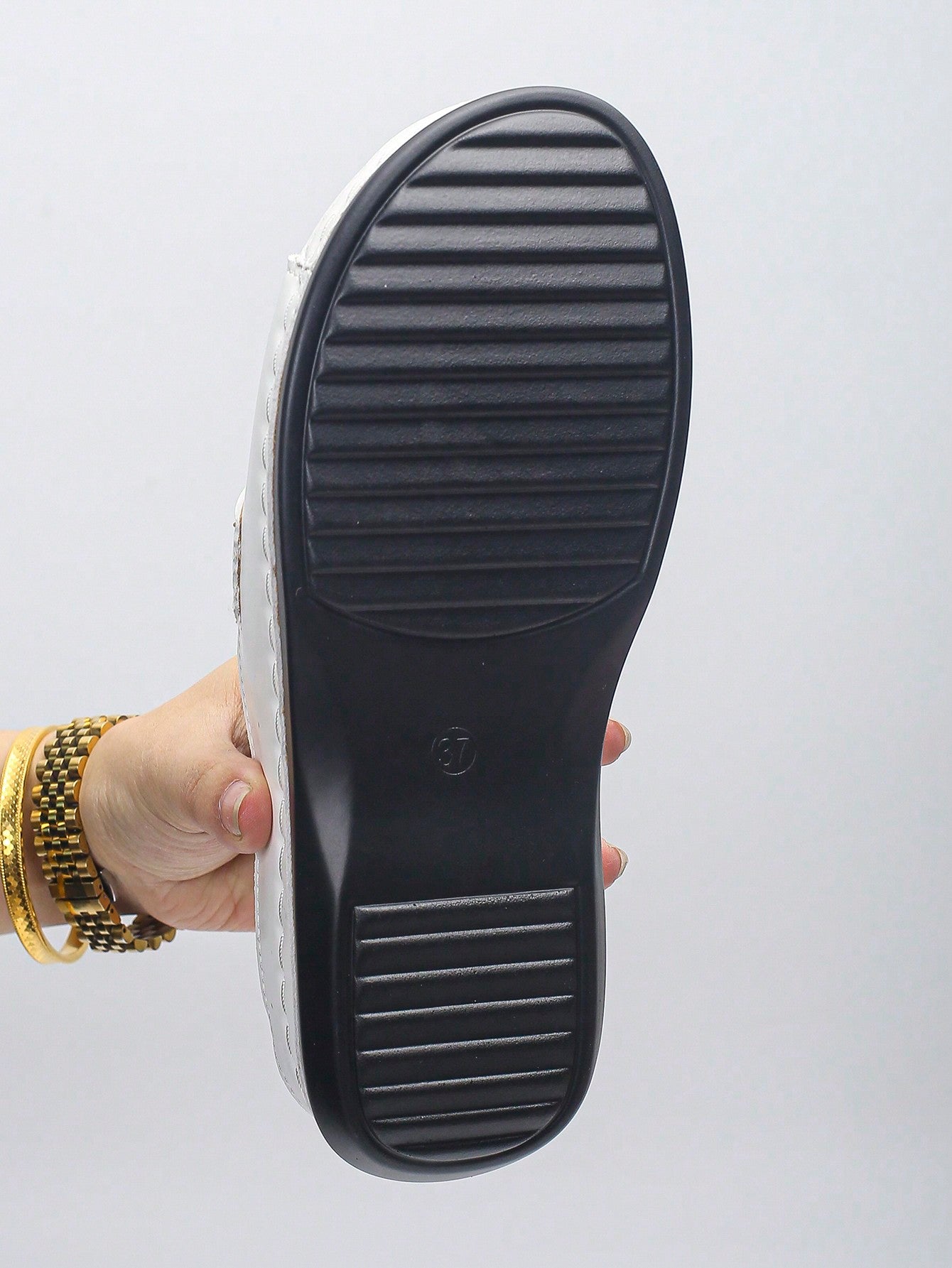Women's bohemian wedge slide sandals with open toe, low wedge heel, slip-on design, and metal detail, available in plus sizes 36-43.