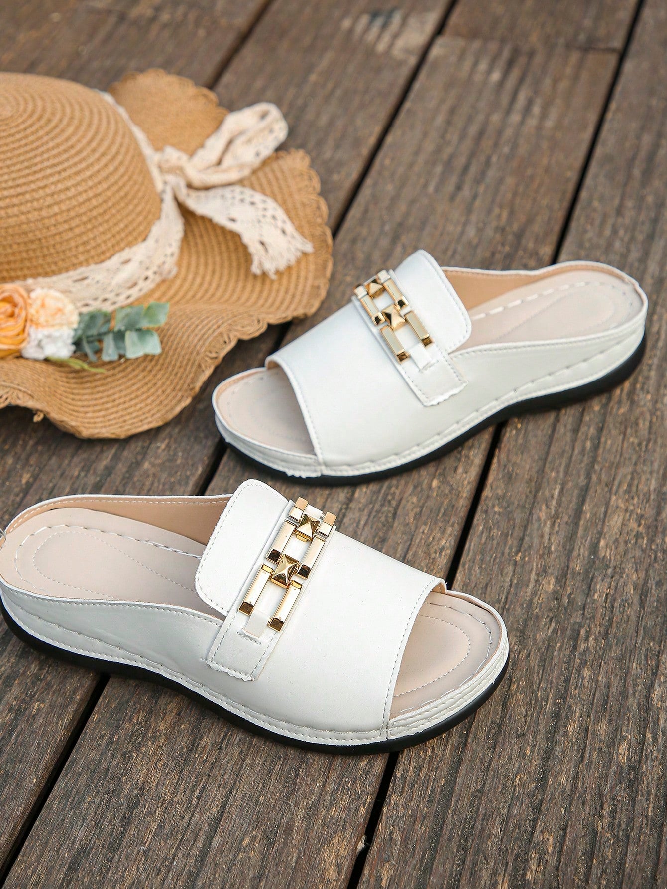 Women's bohemian wedge slide sandals with open toe, low wedge heel, slip-on design, and metal detail, available in plus sizes 36-43.