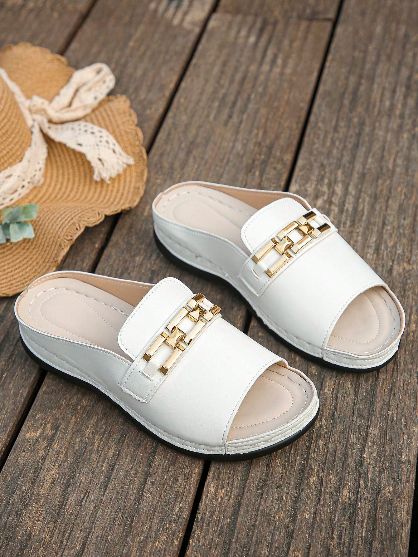 Women's bohemian wedge slide sandals with open toe, low wedge heel, slip-on design, and metal detail, available in plus sizes 36-43.