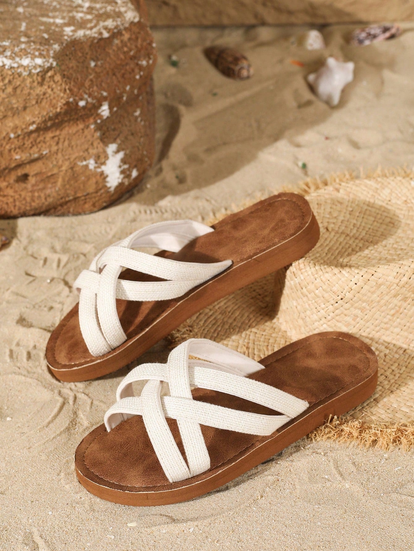 Women's flat lace slide sandals with an open-toe, hollow breathable upper and lightweight beach slipper design.