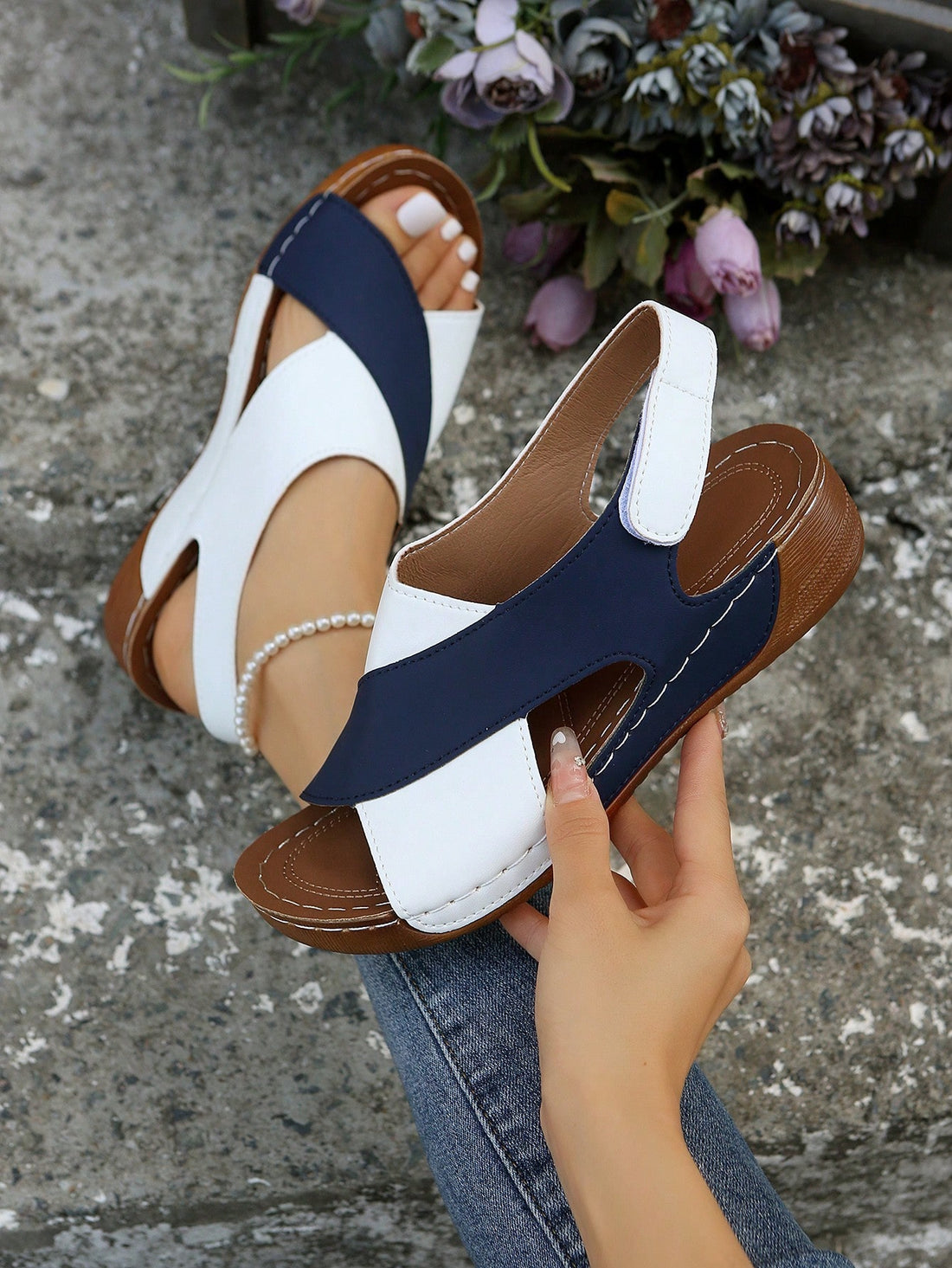 Women's color block platform flat sandals with open toe, criss-cross straps, and hook-loop closure, featuring a low heel thick sole design for casual vacation wear.