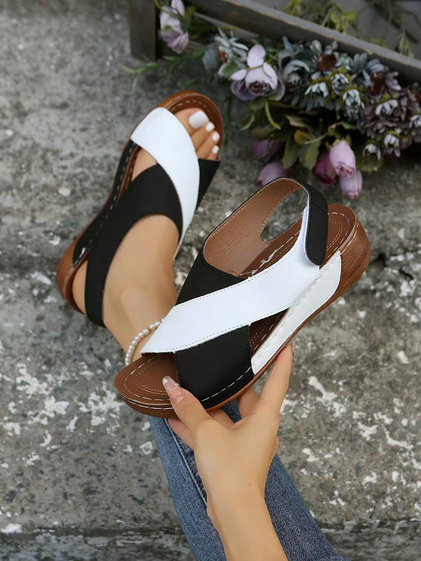 Women's color block platform flat sandals with open toe, criss-cross straps, and hook-loop closure, featuring a low heel thick sole design for casual vacation wear.