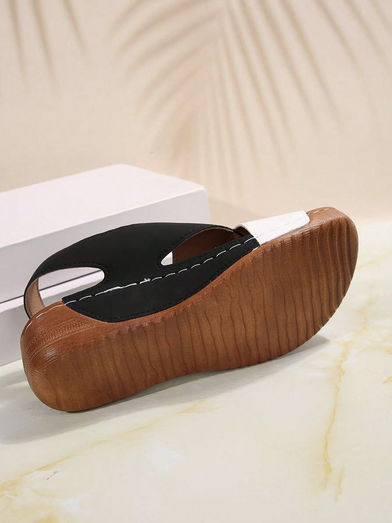 Women's color block platform flat sandals with open toe, criss-cross straps, and hook-loop closure, featuring a low heel thick sole design for casual vacation wear.
