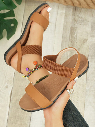 Women's open-toe flat slide sandals with a thick bottom, elastic strap detail, soft midsole, and anti-slip sole for casual beach and outdoor wear.
