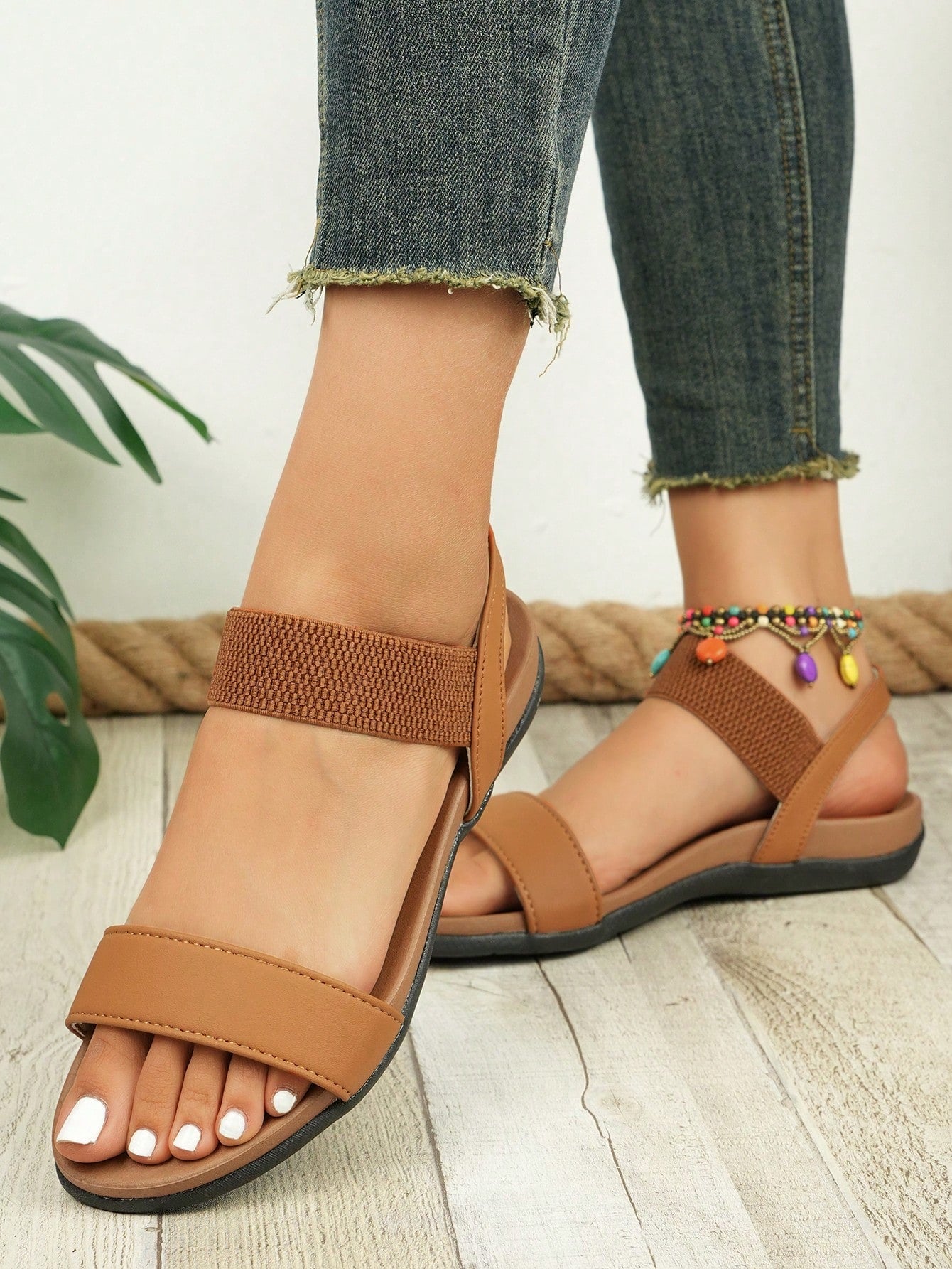 Women's open-toe flat slide sandals with a thick bottom, elastic strap detail, soft midsole, and anti-slip sole for casual beach and outdoor wear.