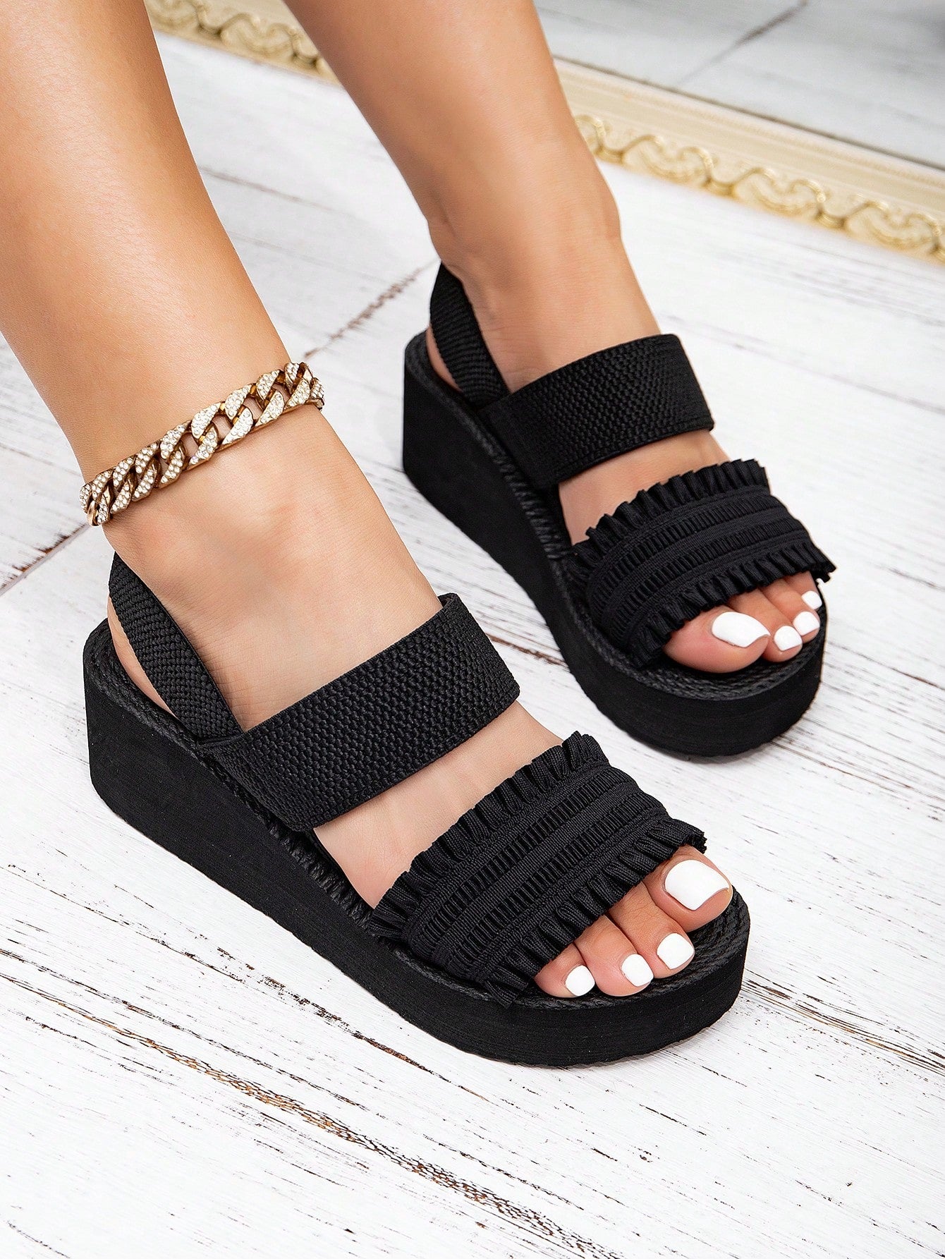 Women's beige slip-on platform wedge slide sandals with open toe, tassel and ruffle details, rope-pattern styling, and mid heel.