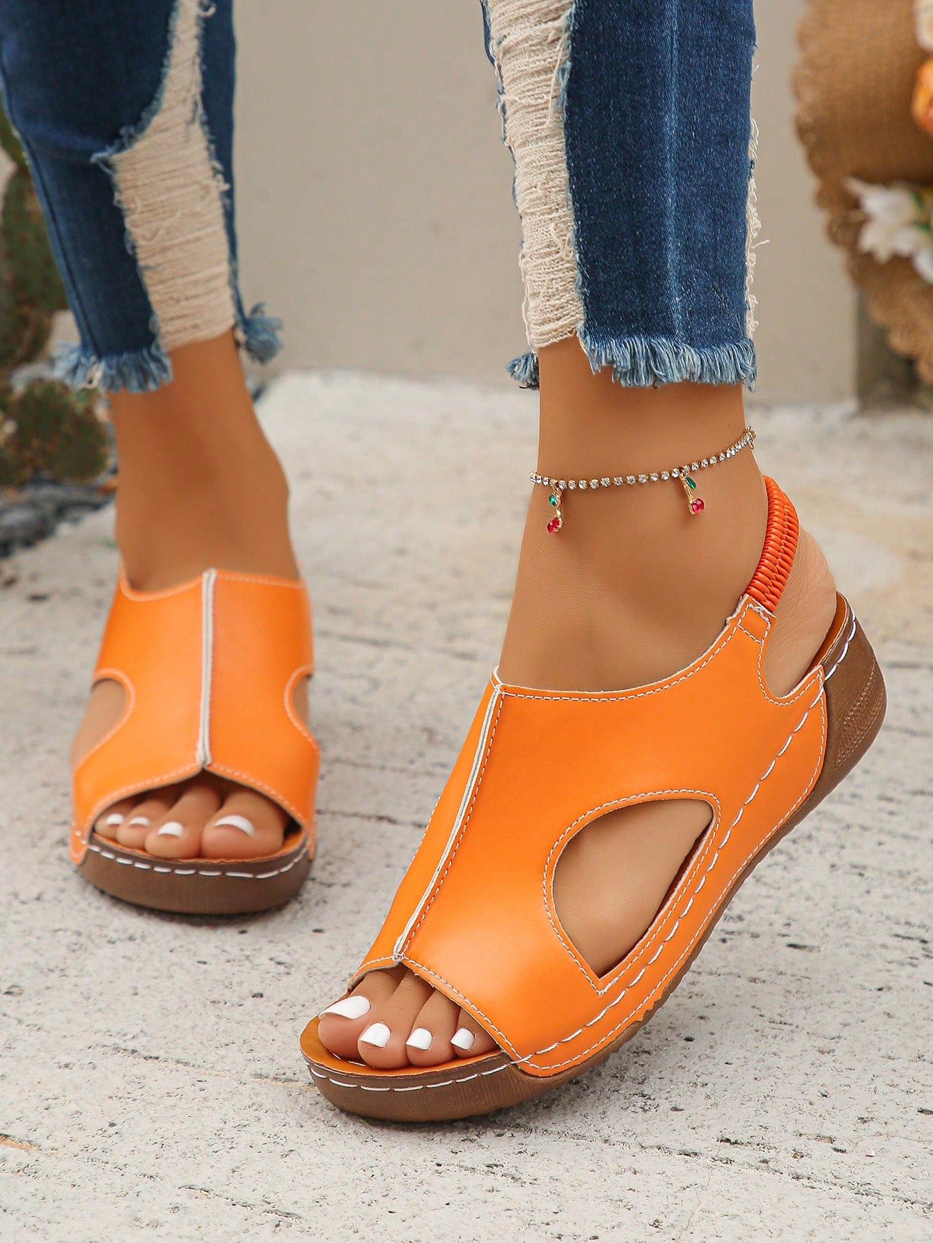 Women’s white PU platform wedge sandals with slip-on design, slingback strap, open round toe, and cut-out details, suitable for beach and vacation wear.