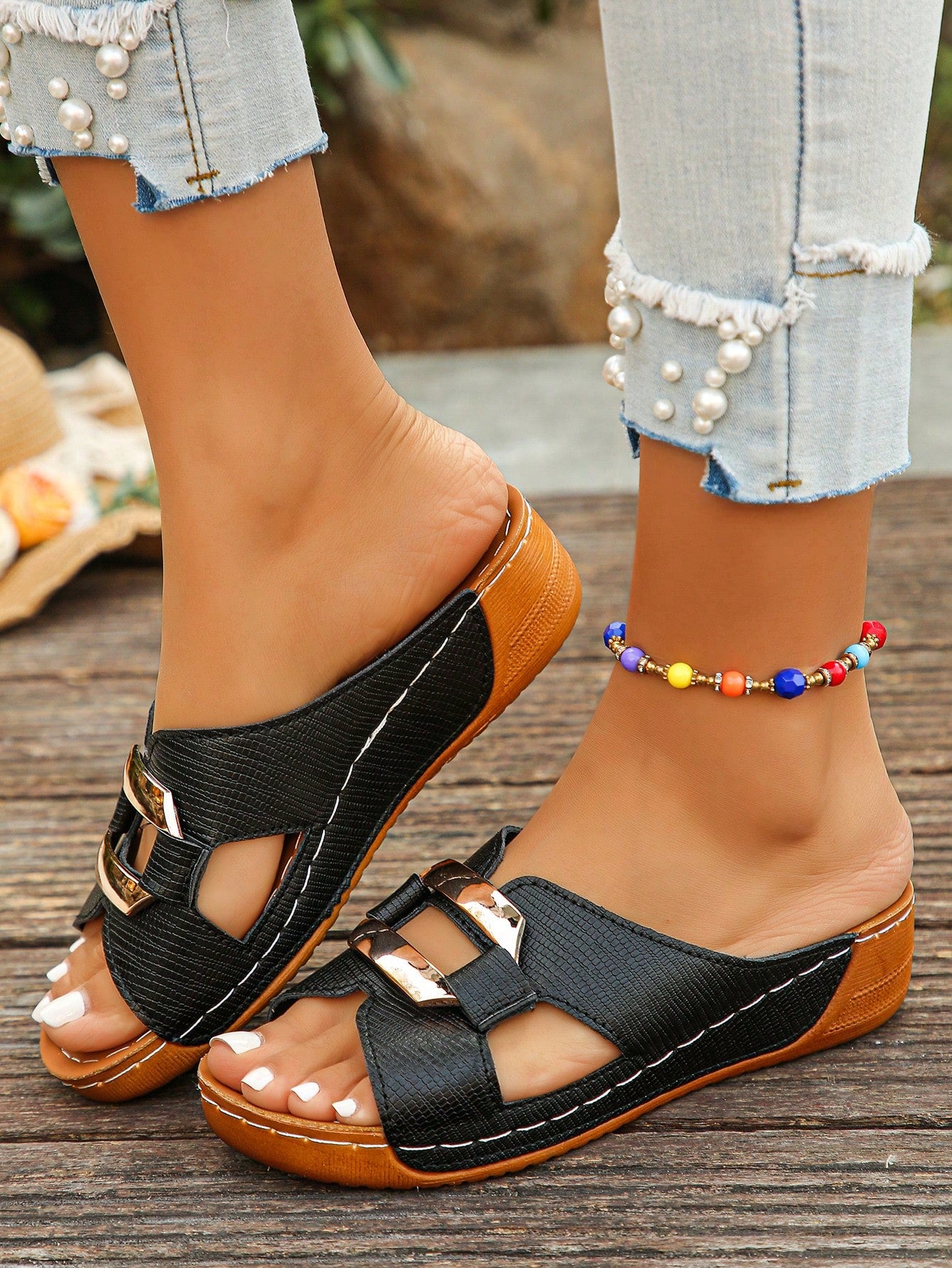 Women’s open toe wedge slide sandals with metal buckle detail and thick low wedge sole, lightweight slip-on style for daily wear, beach, and holiday use.