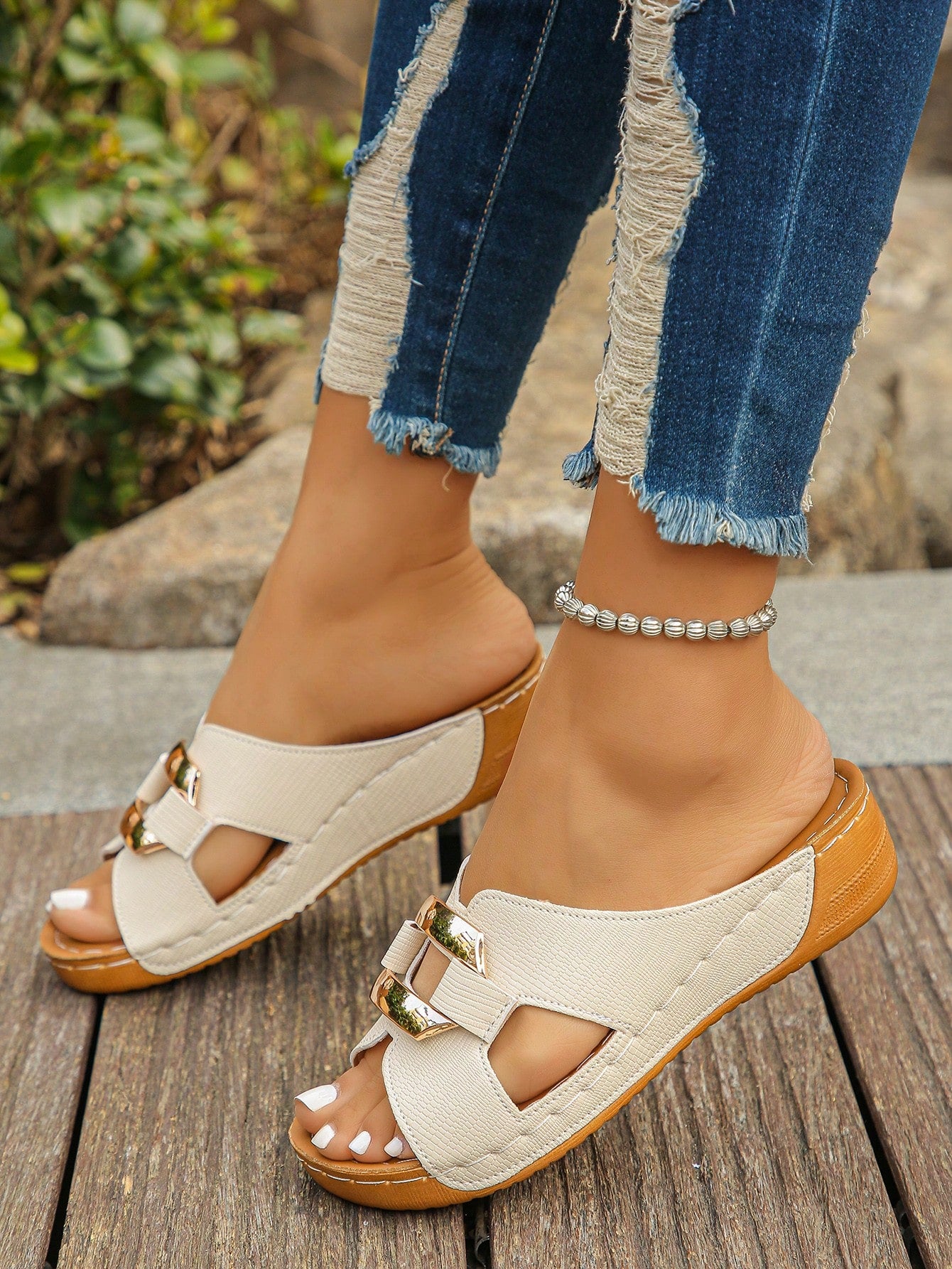 Women’s open toe wedge slide sandals with metal buckle detail and thick low wedge sole, lightweight slip-on style for daily wear, beach, and holiday use.
