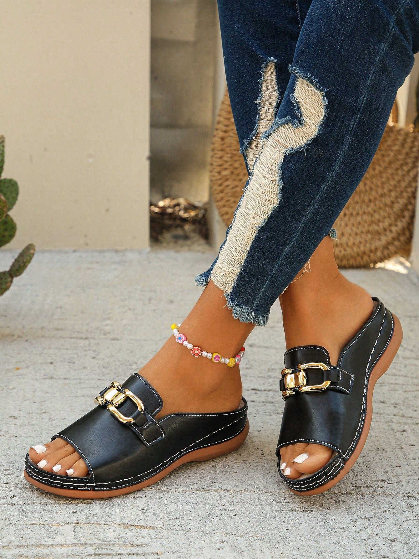 Women's bohemian wedge slide sandals with open toe, low wedge heel, slip-on design, and metal detail, available in plus sizes 36-43.