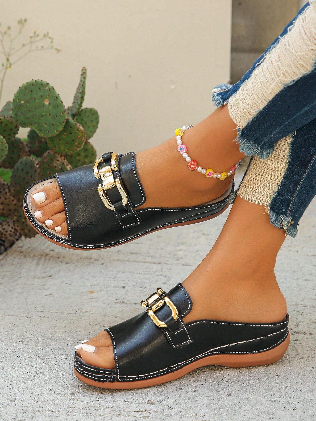 Women's bohemian wedge slide sandals with open toe, low wedge heel, slip-on design, and metal detail, available in plus sizes 36-43.