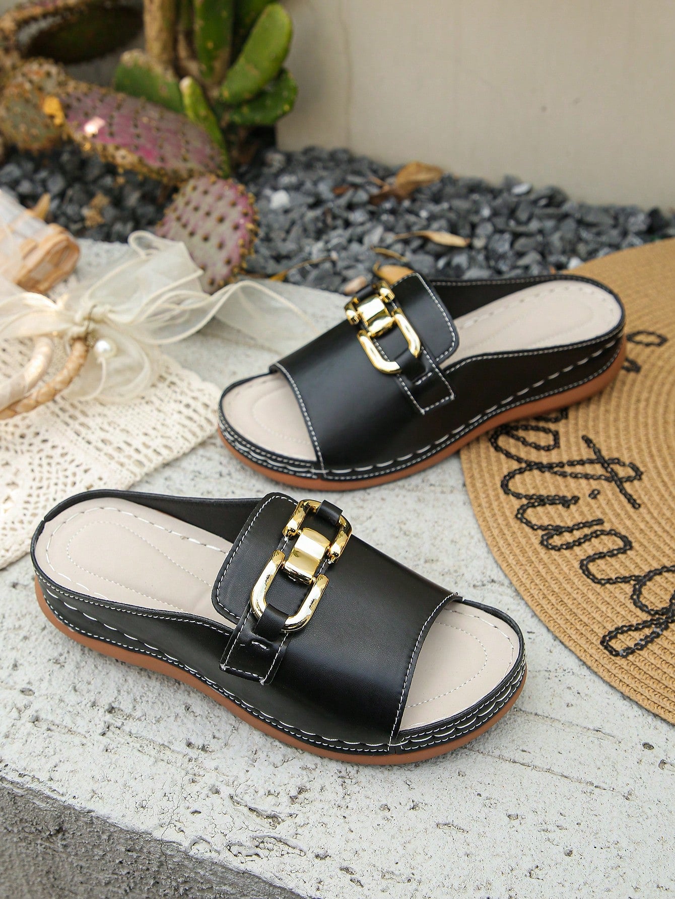 Women's bohemian wedge slide sandals with open toe, low wedge heel, slip-on design, and metal detail, available in plus sizes 36-43.