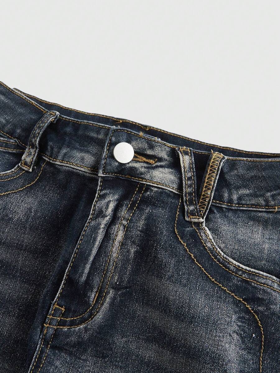 Blue washed shorts with butterfly embroidery, distressed detailing, ultra low waist, button closure, zipper fly, and pockets.