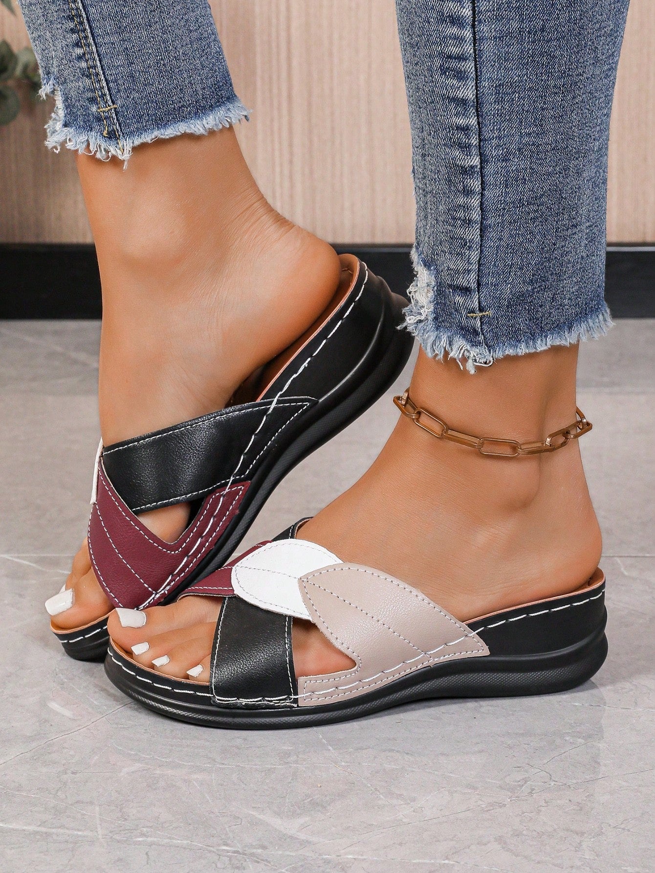 Women's multicolor wedge slide sandals with open toe, criss-cross straps, cut-out details, slip-on closure, and mid chunky wedge heel.