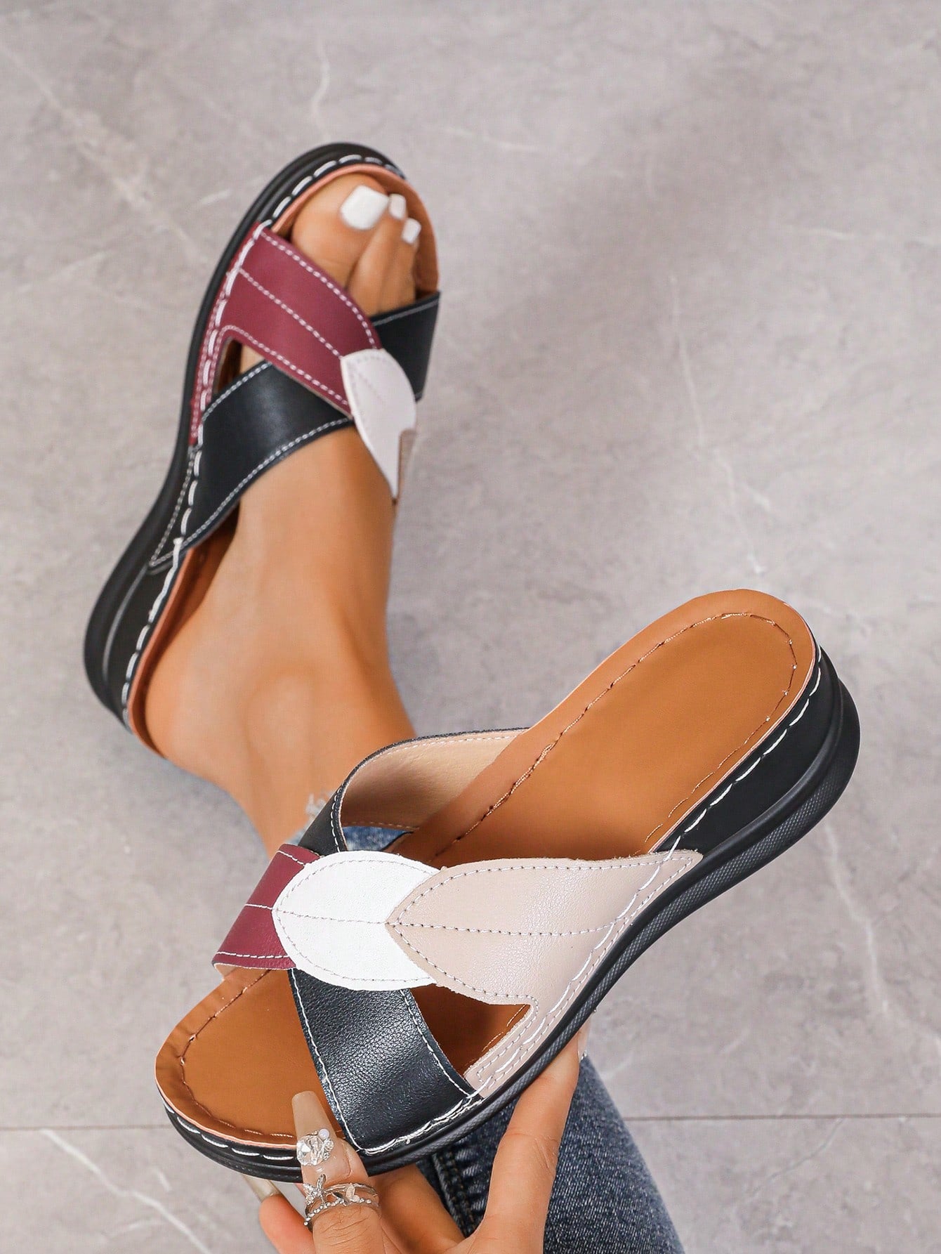 Women's multicolor wedge slide sandals with open toe, criss-cross straps, cut-out details, slip-on closure, and mid chunky wedge heel.