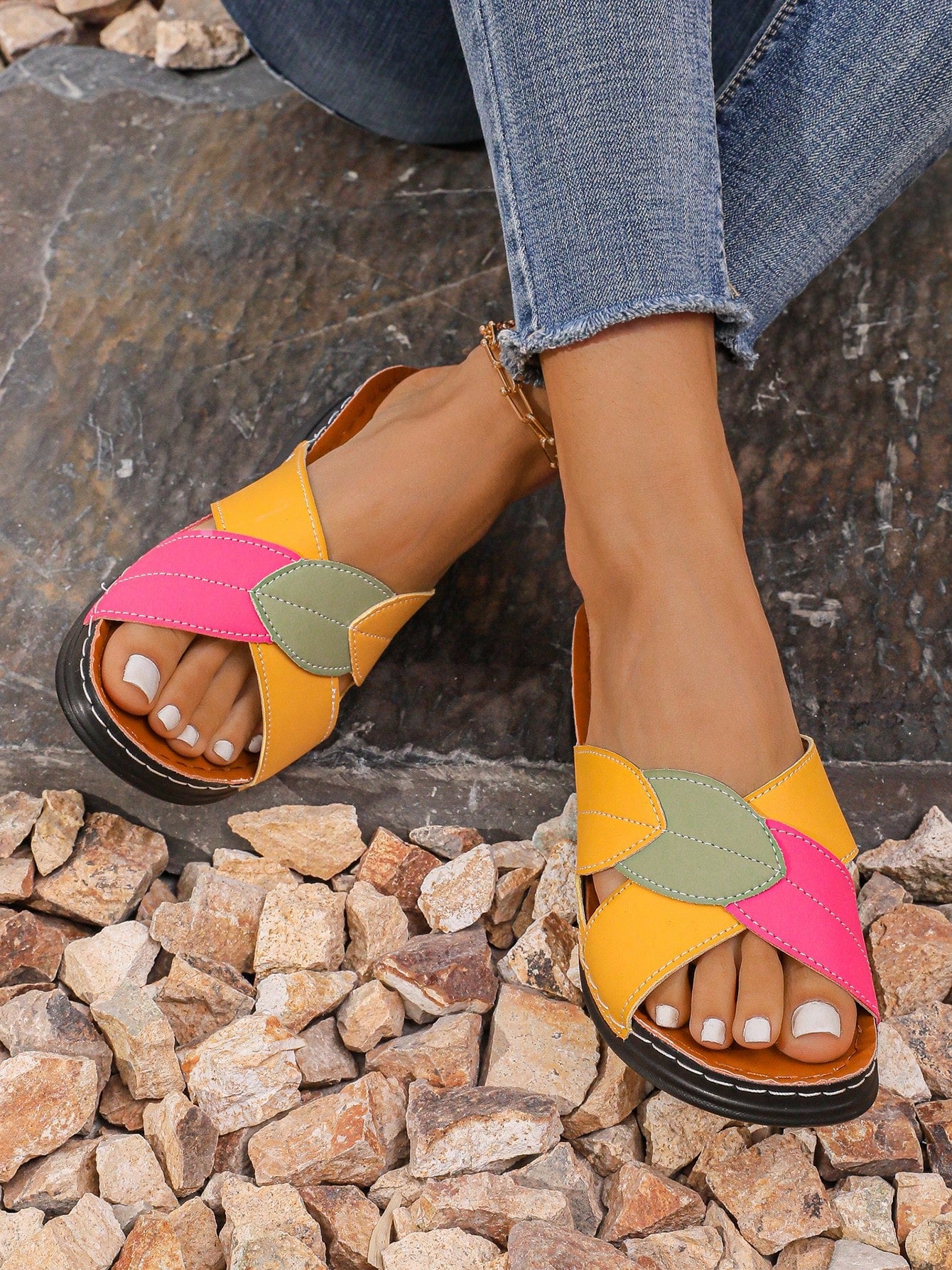 Women's multicolor wedge slide sandals with open toe, criss-cross straps, cut-out details, slip-on closure, and mid chunky wedge heel.