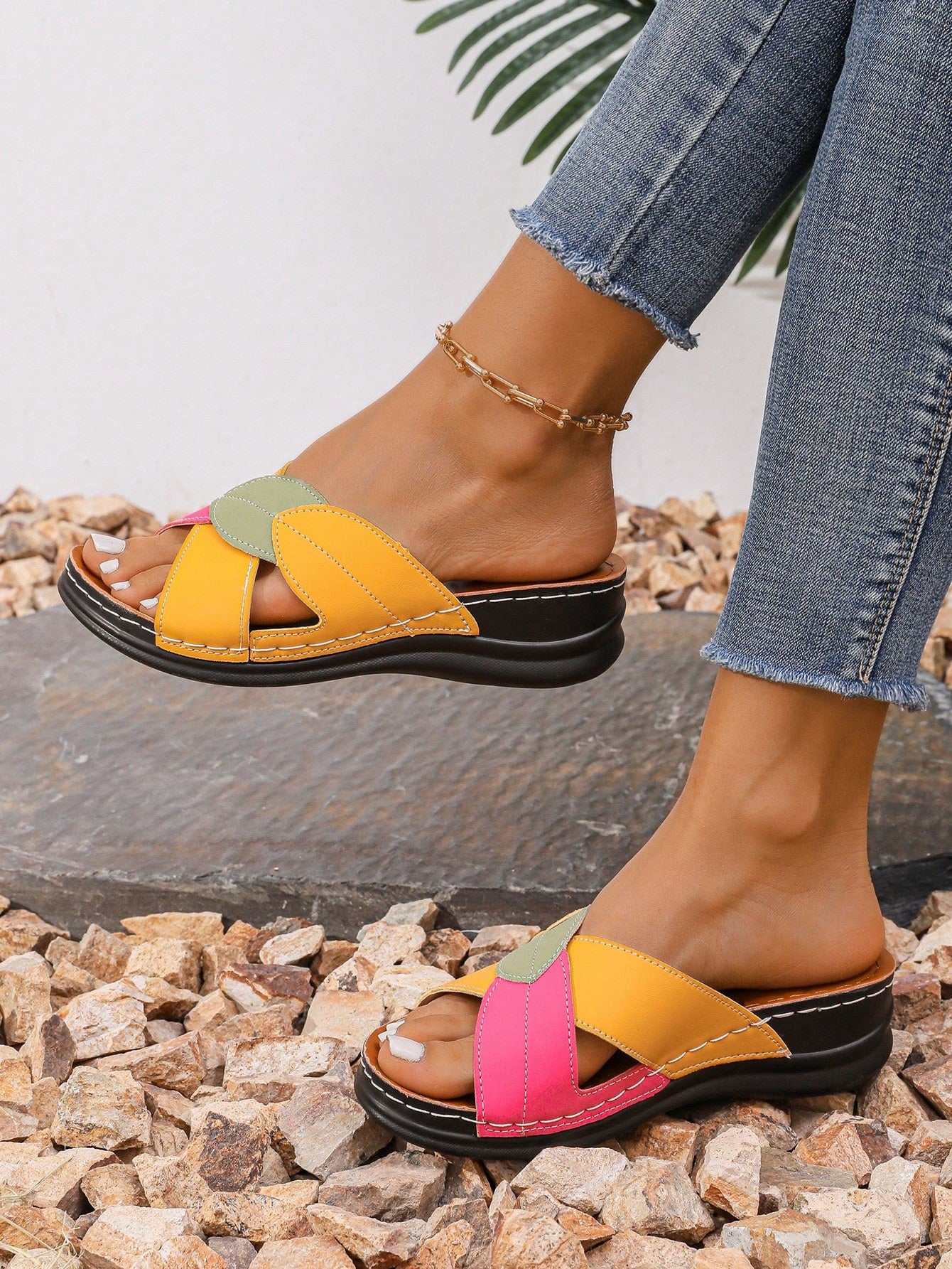 Women's multicolor wedge slide sandals with open toe, criss-cross straps, cut-out details, slip-on closure, and mid chunky wedge heel.