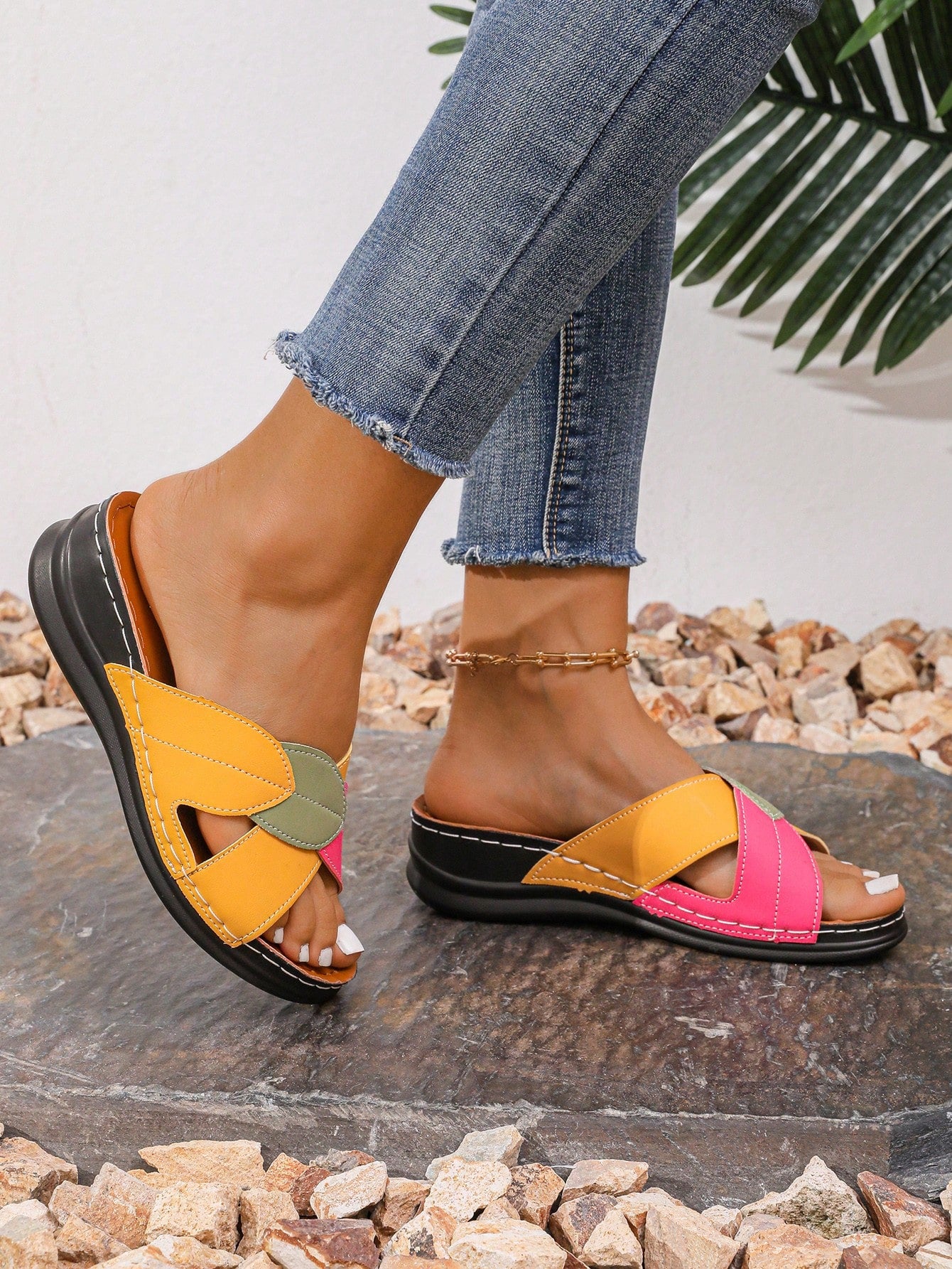 Women's multicolor wedge slide sandals with open toe, criss-cross straps, cut-out details, slip-on closure, and mid chunky wedge heel.