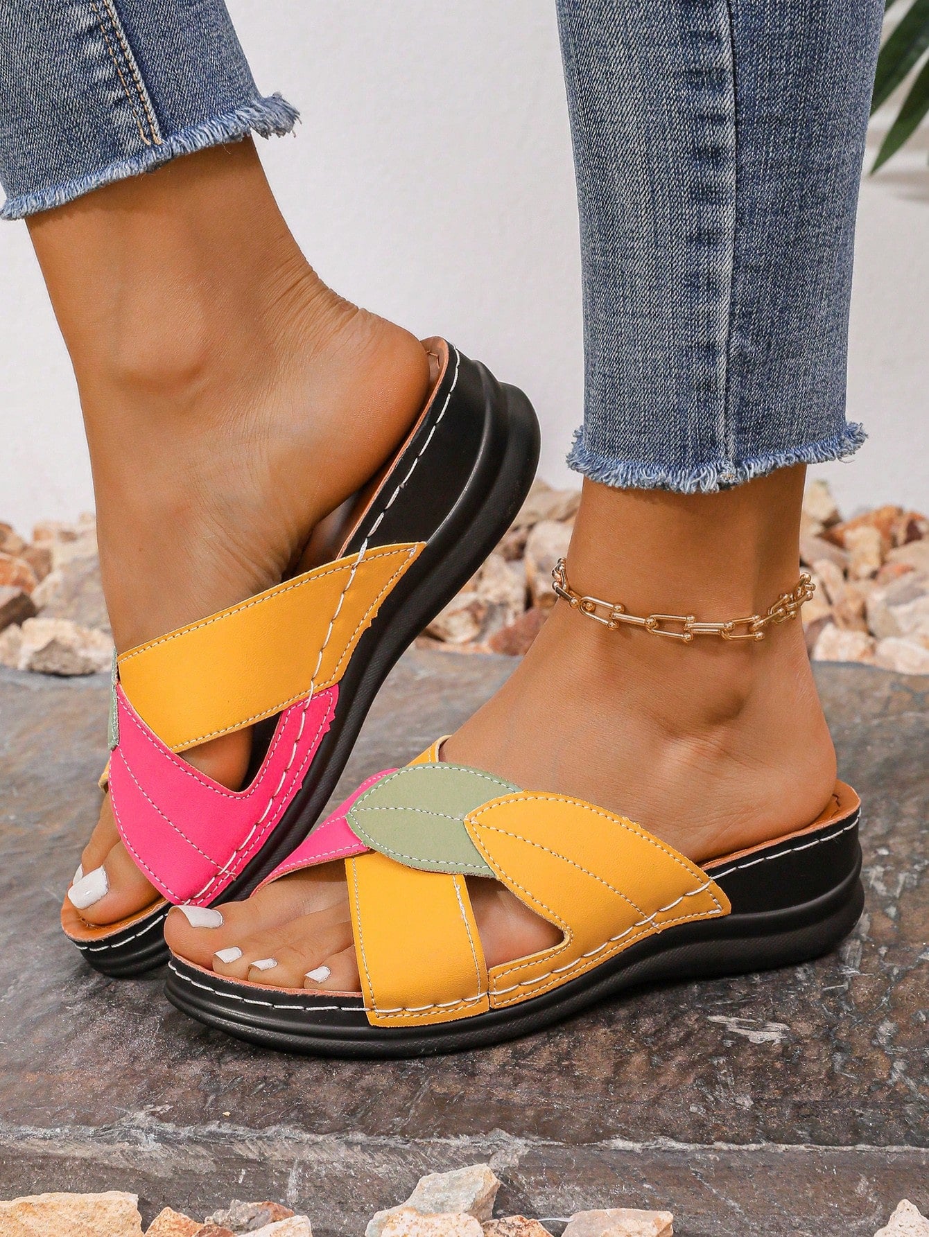 Women's multicolor wedge slide sandals with open toe, criss-cross straps, cut-out details, slip-on closure, and mid chunky wedge heel.