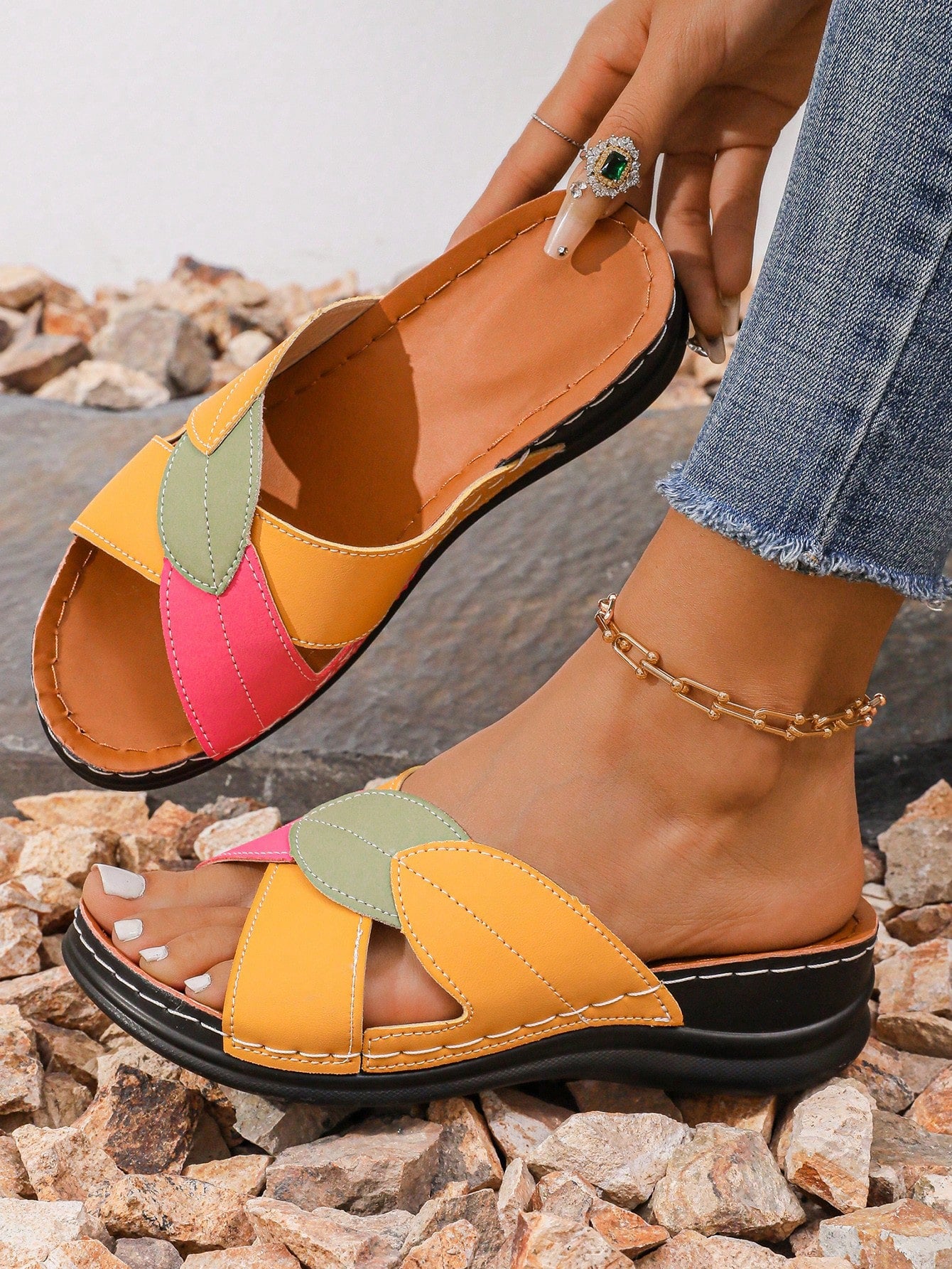 Women's multicolor wedge slide sandals with open toe, criss-cross straps, cut-out details, slip-on closure, and mid chunky wedge heel.