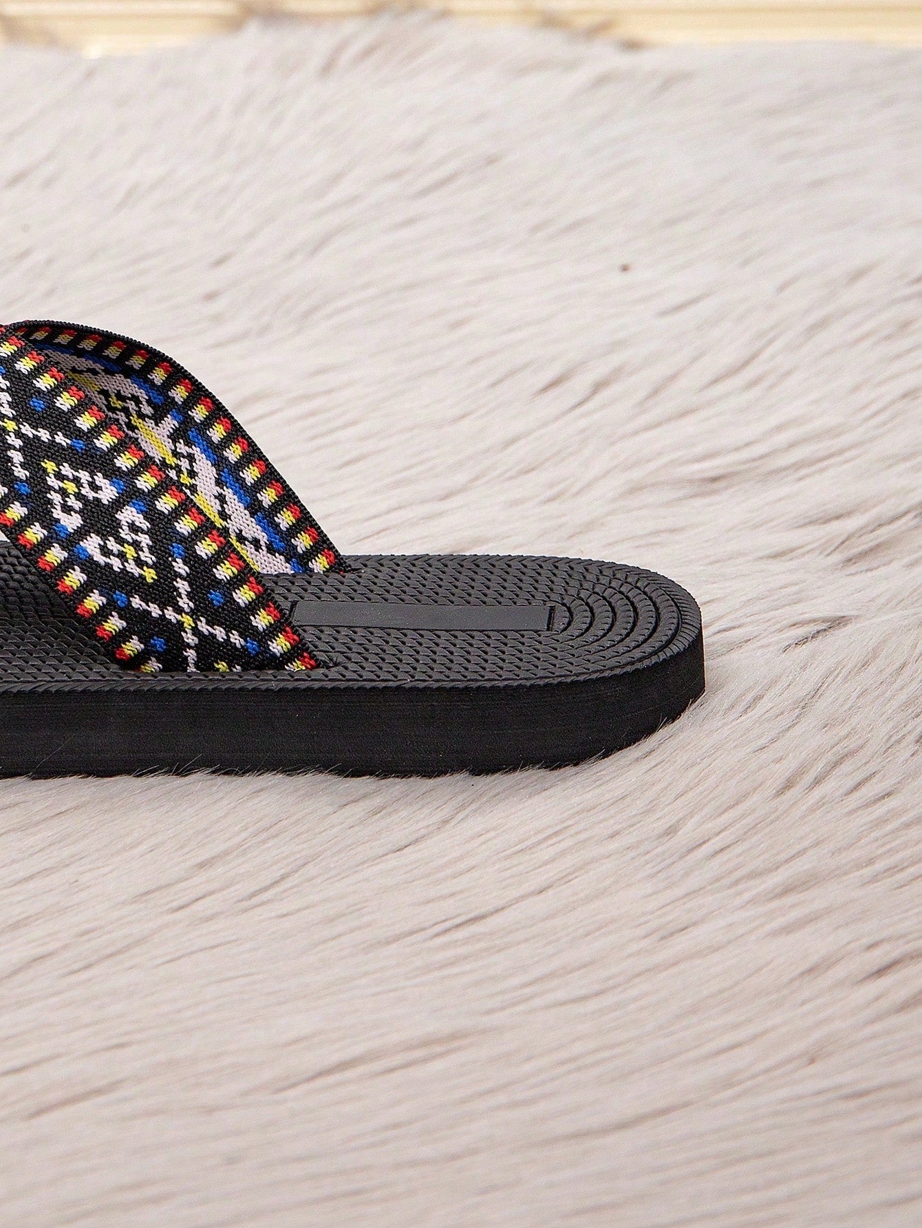 Women's retro-style flat slide sandals with criss-cross straps, open toe, and multicolor geometric print, suitable for casual outdoor and vacation wear.