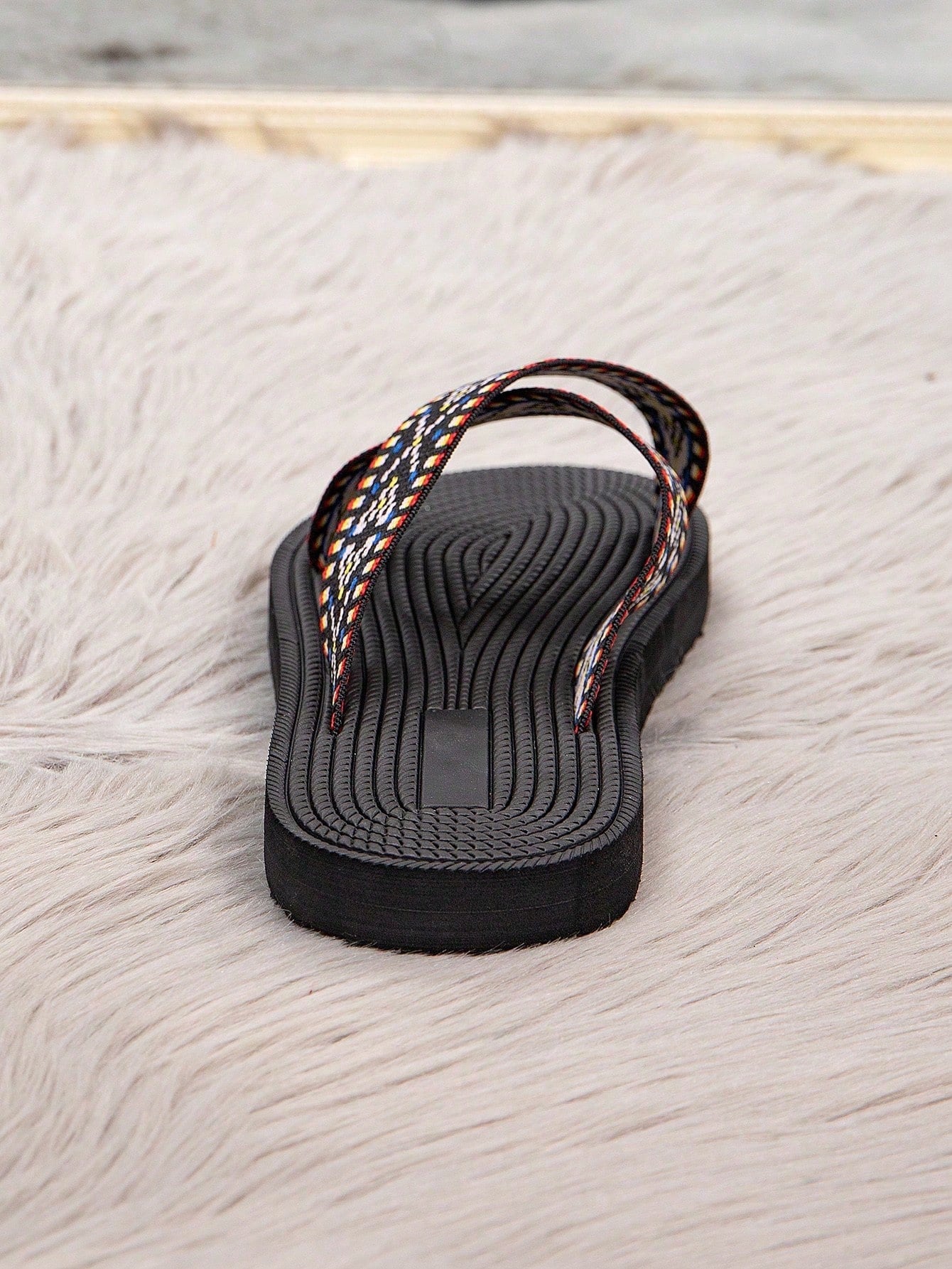 Women's retro-style flat slide sandals with criss-cross straps, open toe, and multicolor geometric print, suitable for casual outdoor and vacation wear.