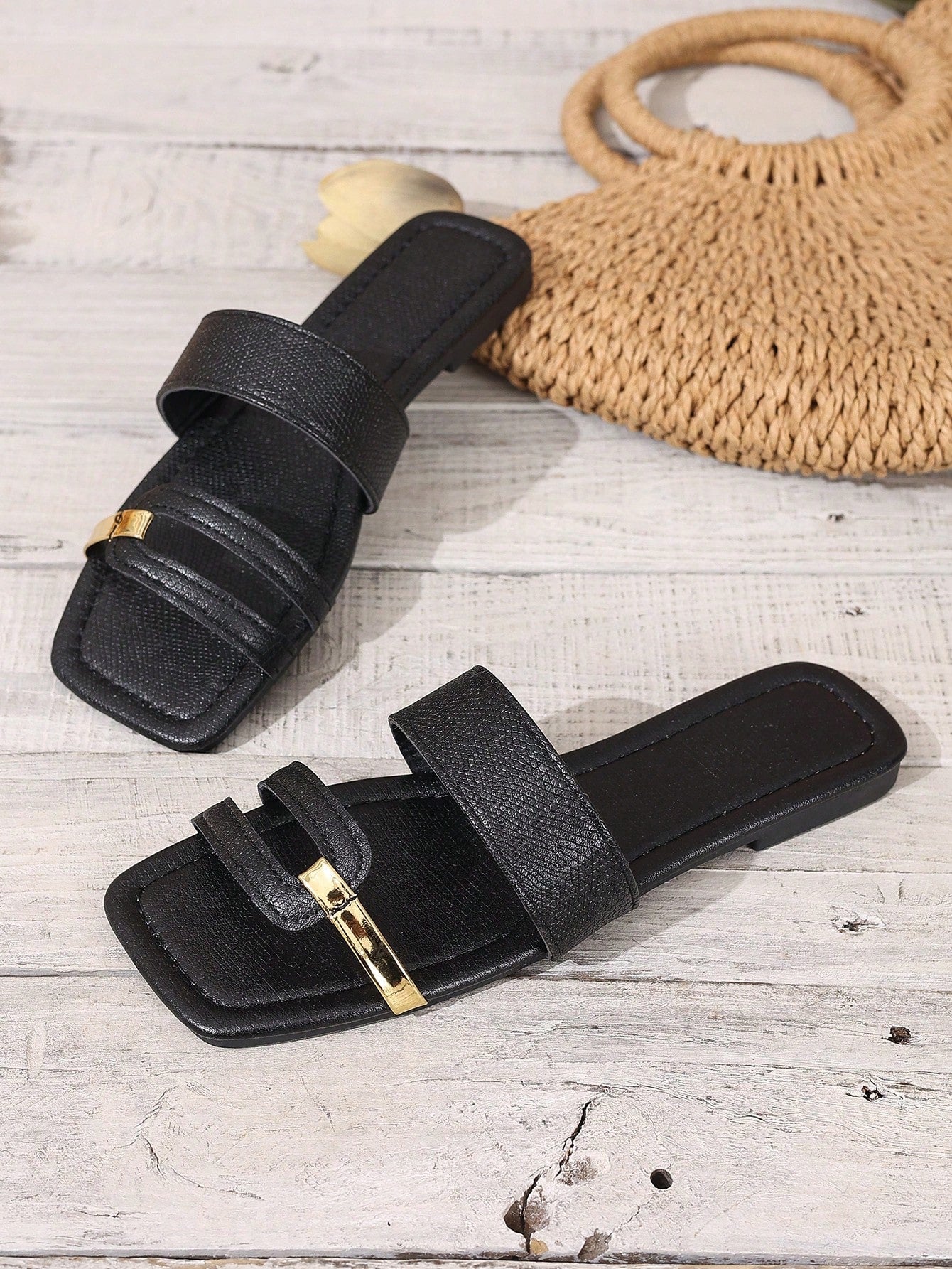 Women's yellow open-toe flat slide sandals featuring a cut-out design and textured plain pattern for casual beach and daily wear.