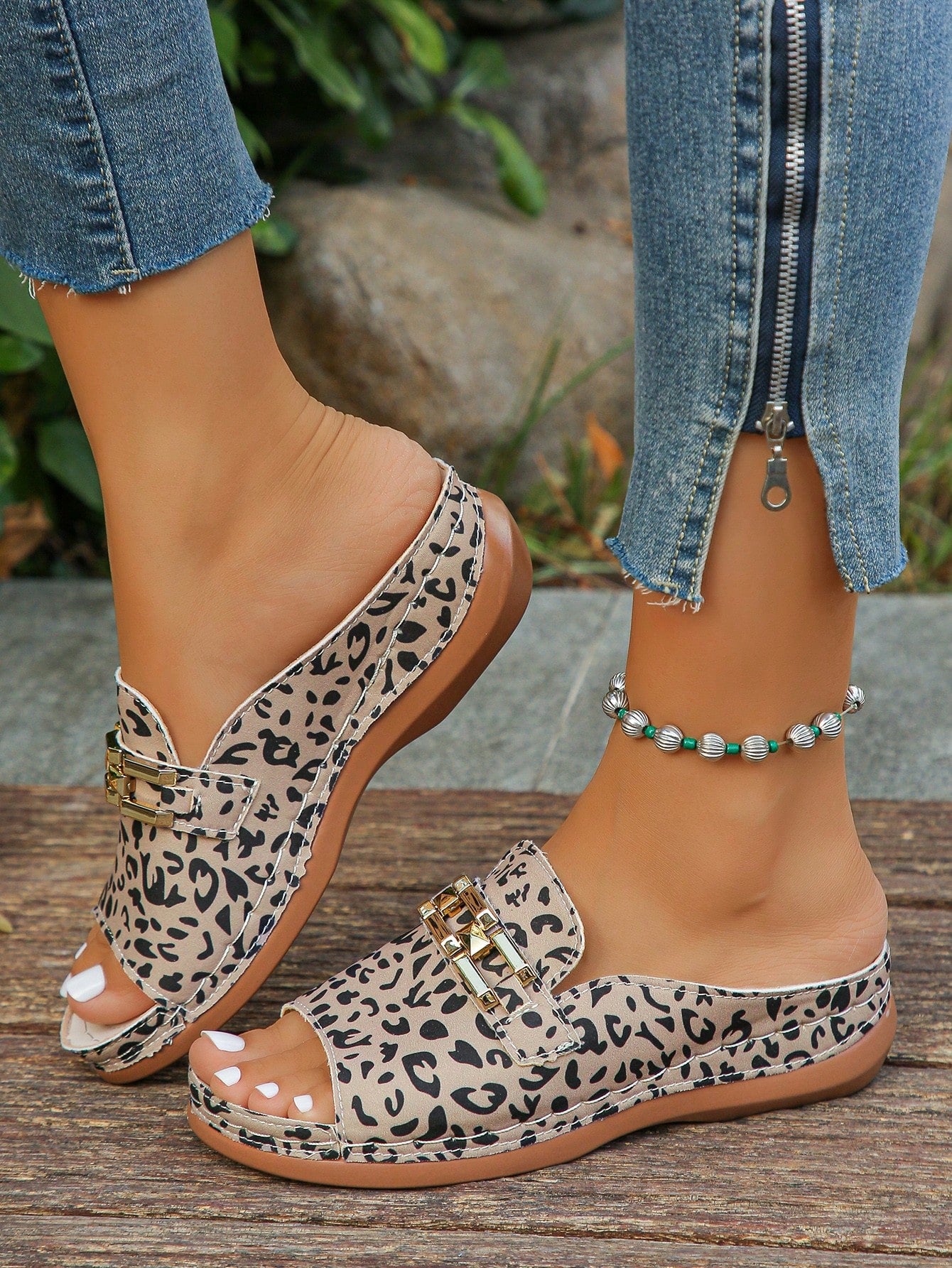 Women's bohemian wedge slide sandals with open toe, low wedge heel, slip-on design, and metal detail, available in plus sizes 36-43.