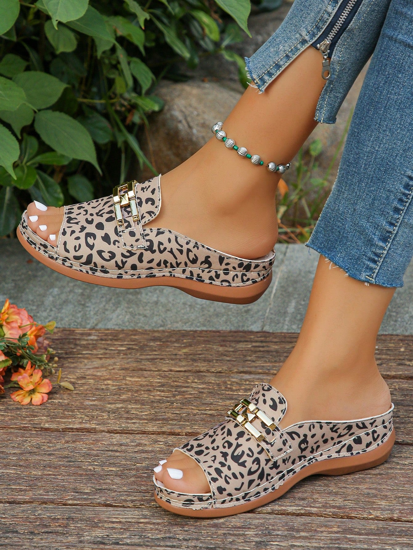 Women's bohemian wedge slide sandals with open toe, low wedge heel, slip-on design, and metal detail, available in plus sizes 36-43.